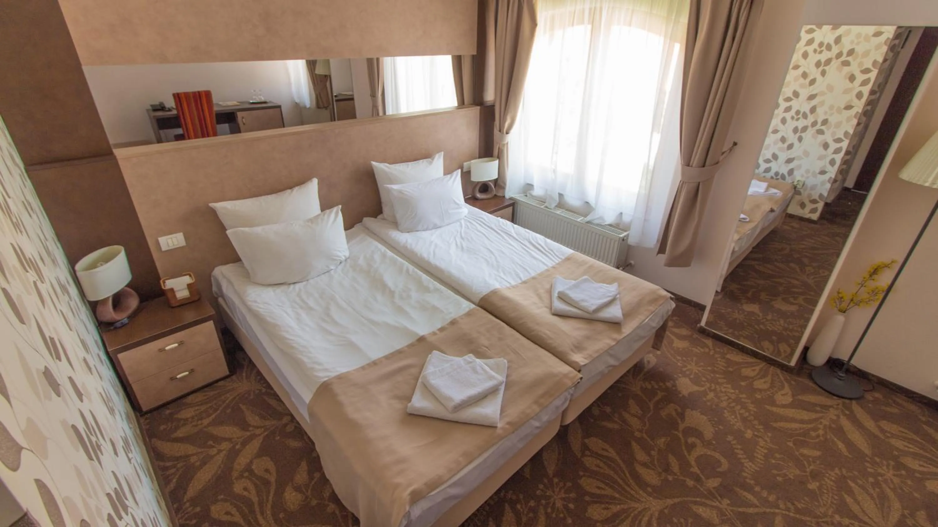 Bed in Pension La Fontana