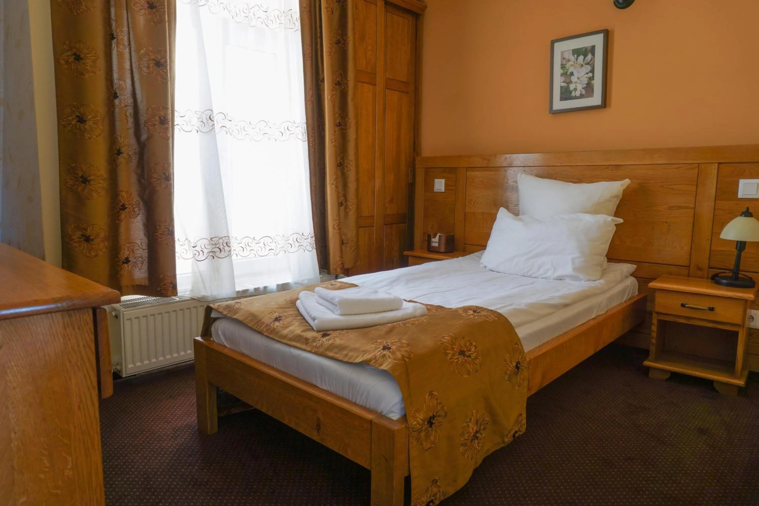 Bed in Pension La Fontana
