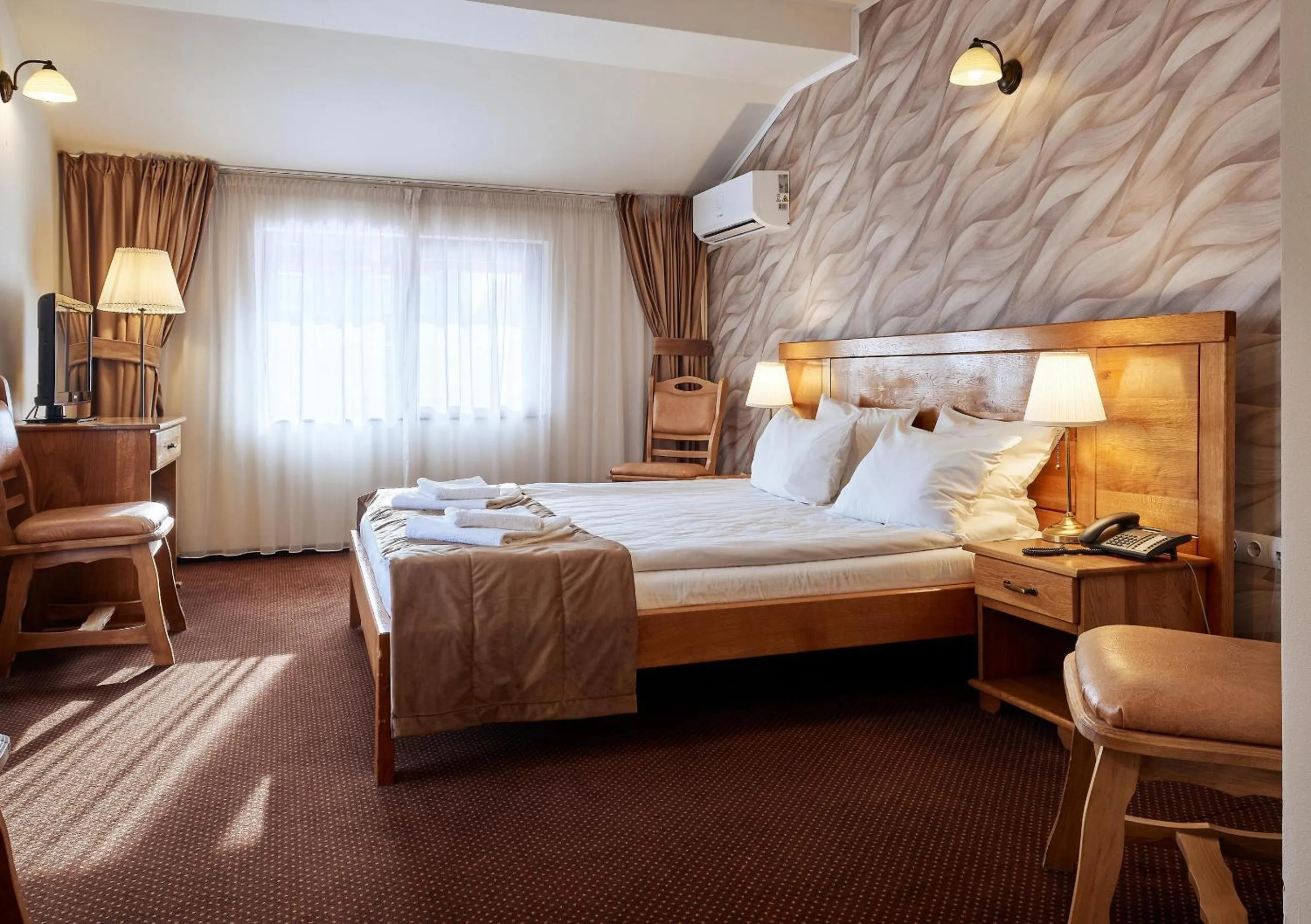Bed in Pension La Fontana