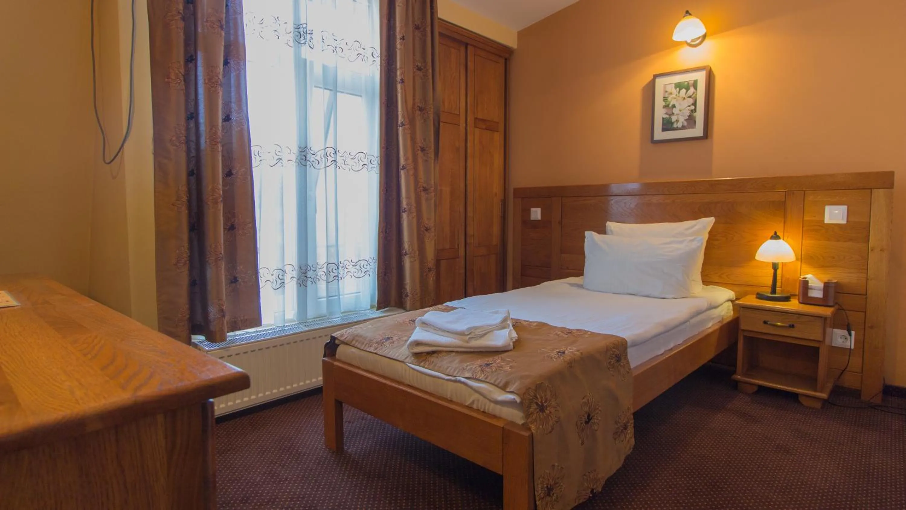 Bed in Pension La Fontana