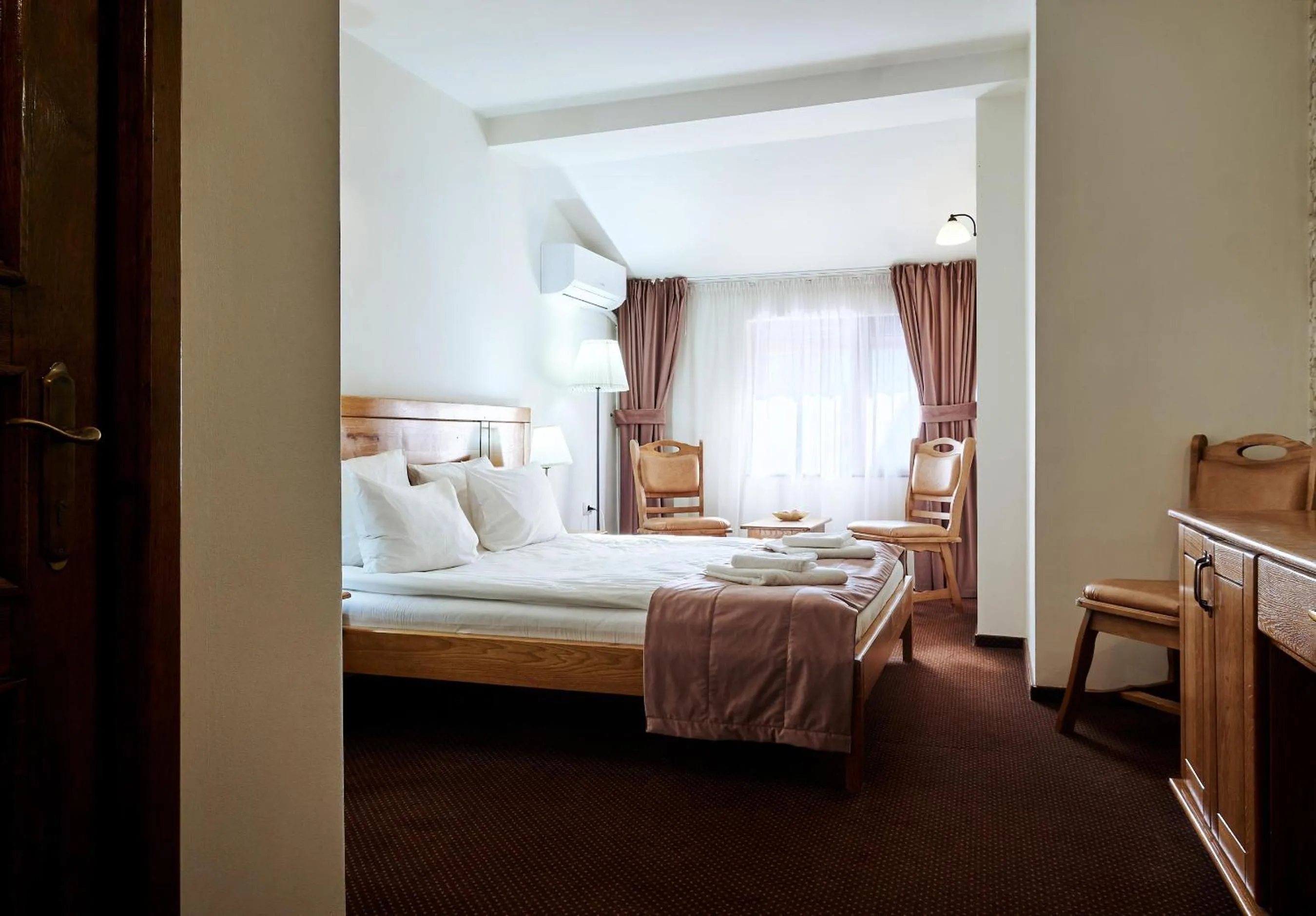Bed in Pension La Fontana