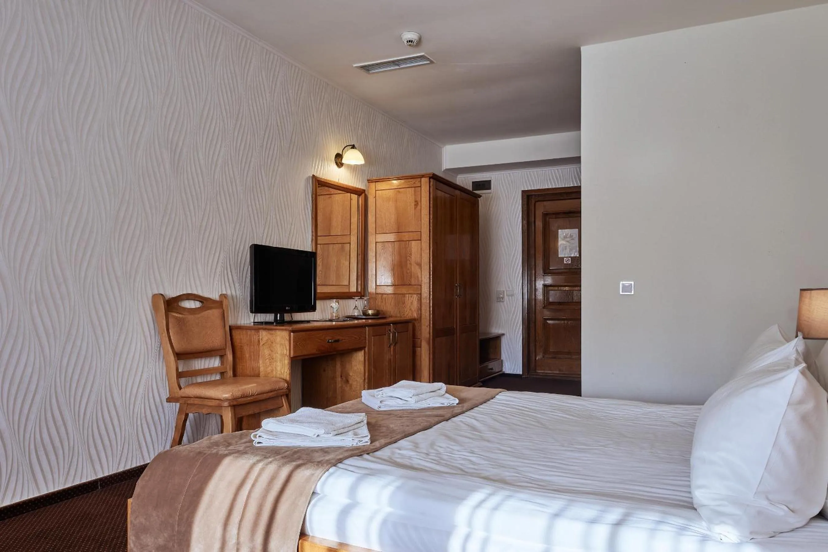 Bed in Pension La Fontana