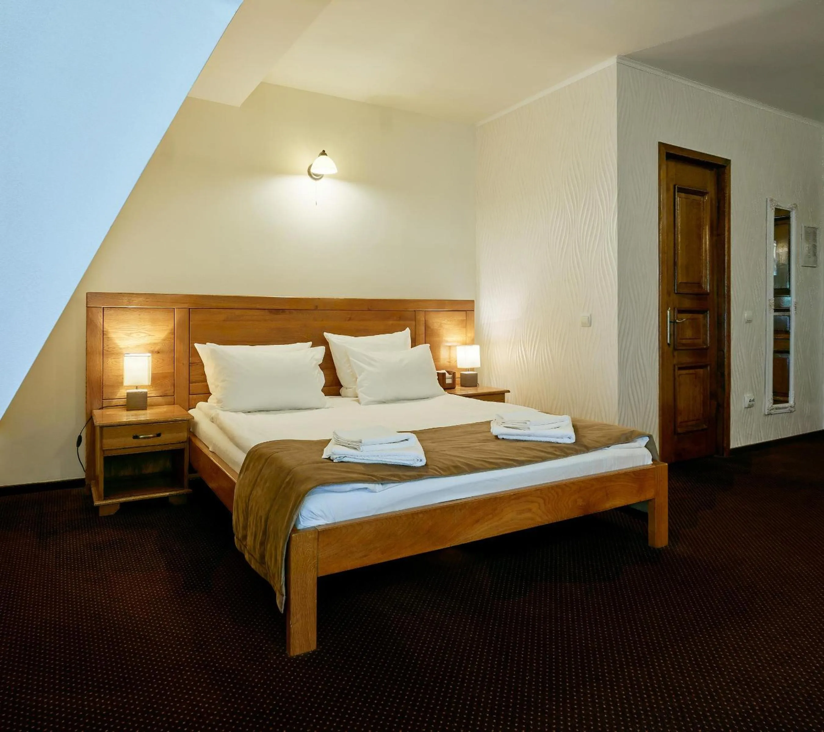 Bed in Pension La Fontana