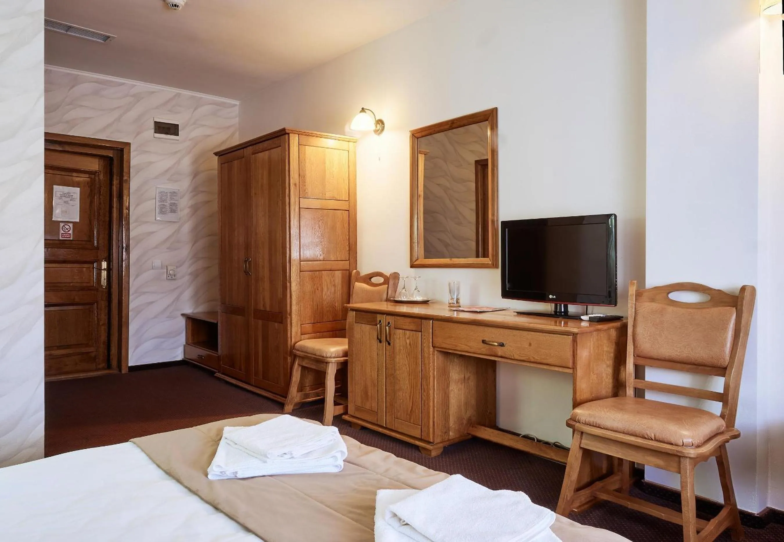 Bed in Pension La Fontana