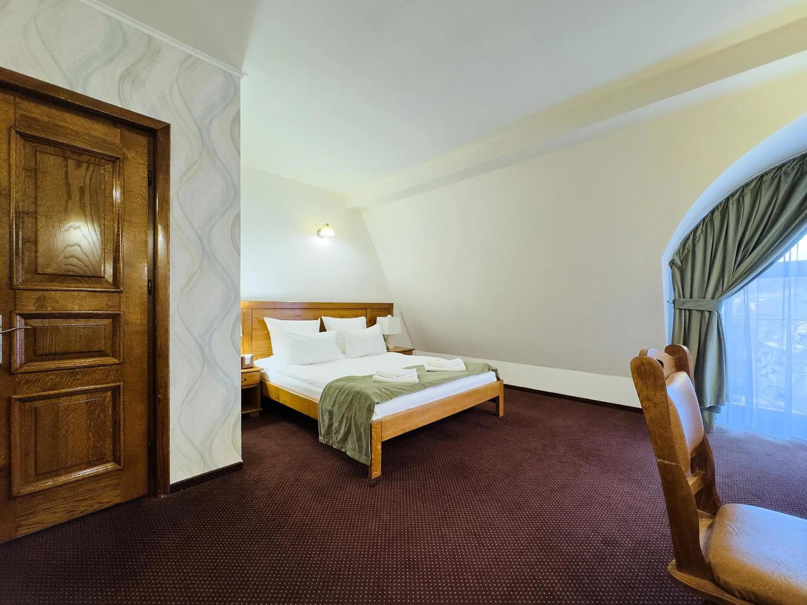 Bed in Pension La Fontana