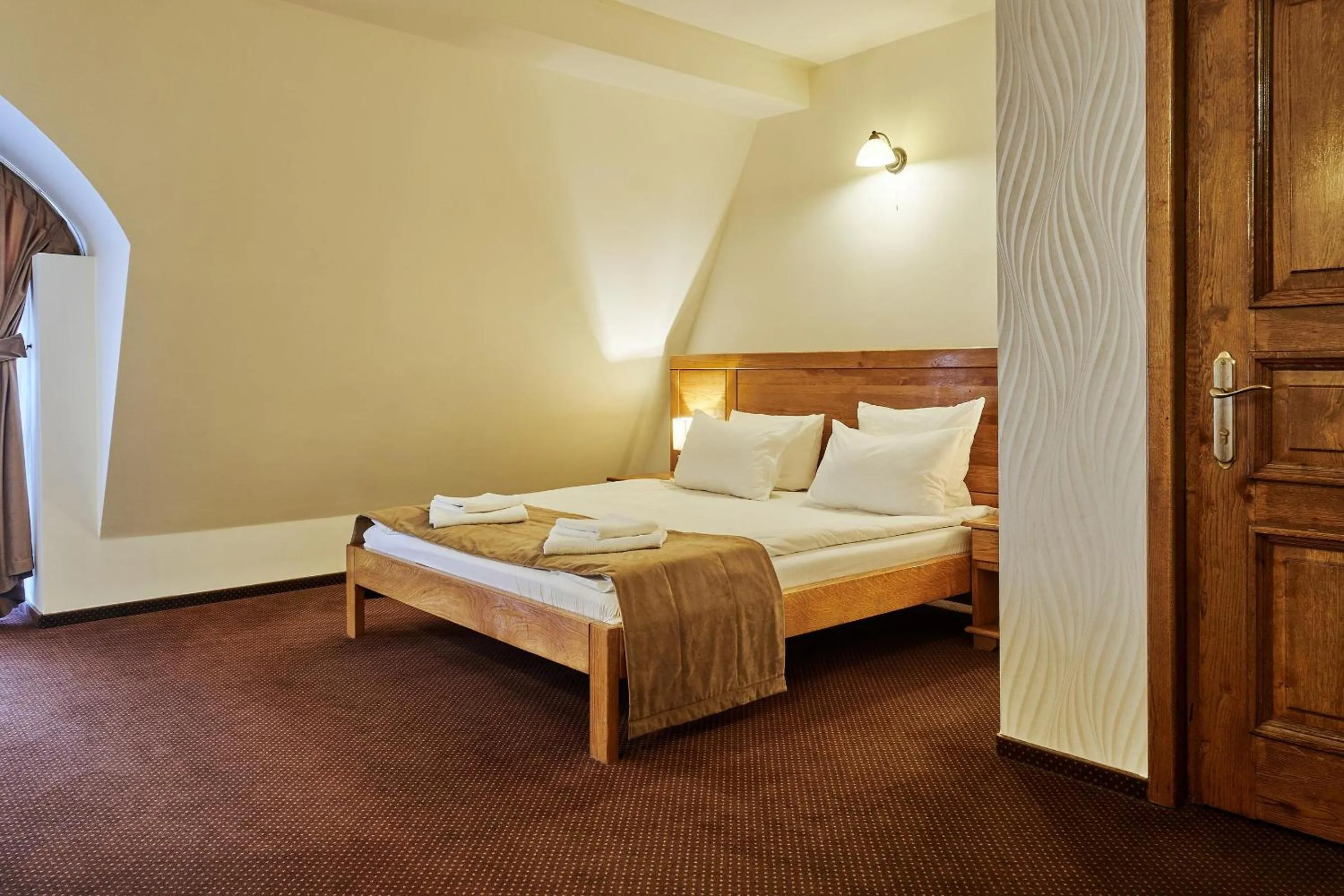 Bed in Pension La Fontana