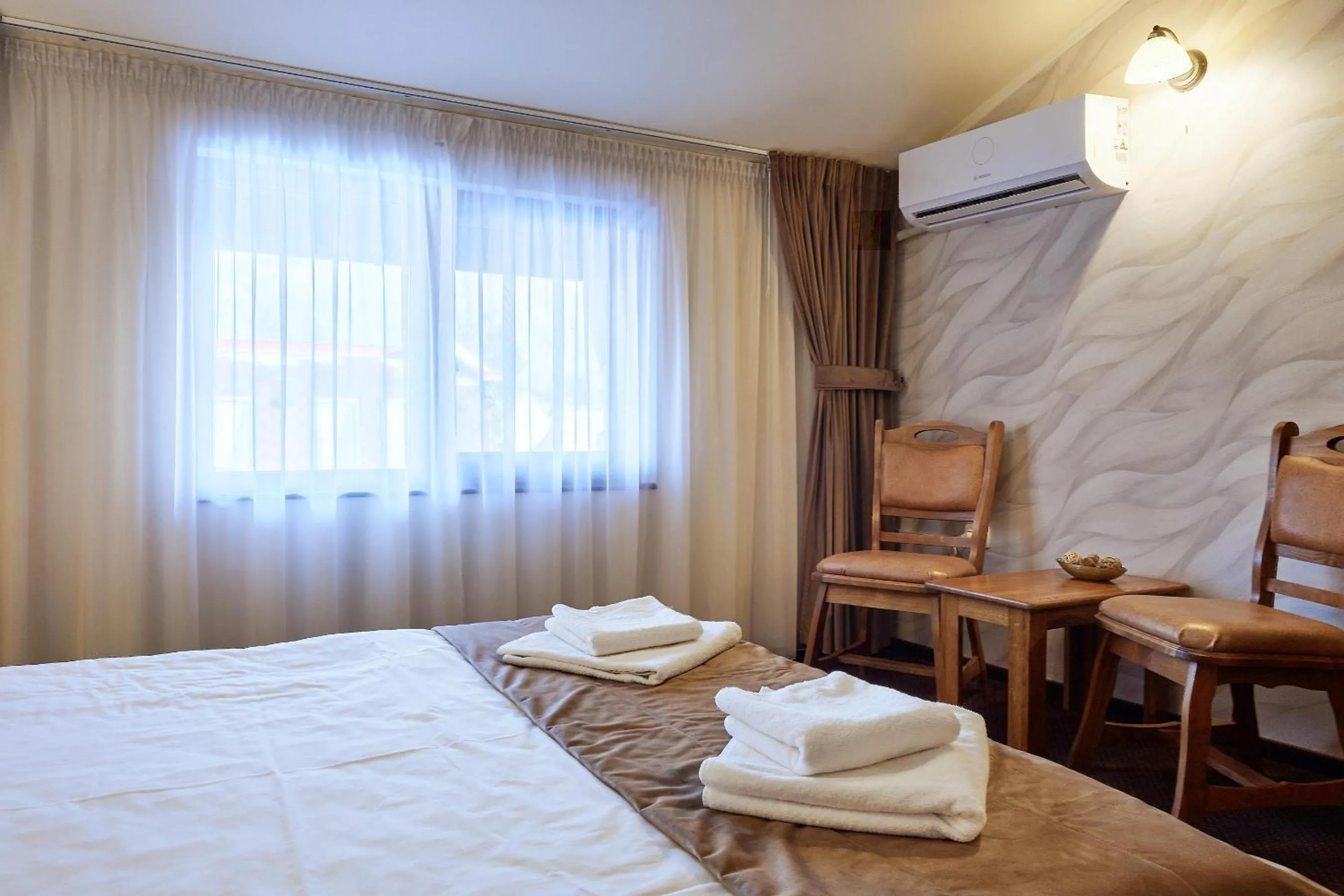 Bed in Pension La Fontana