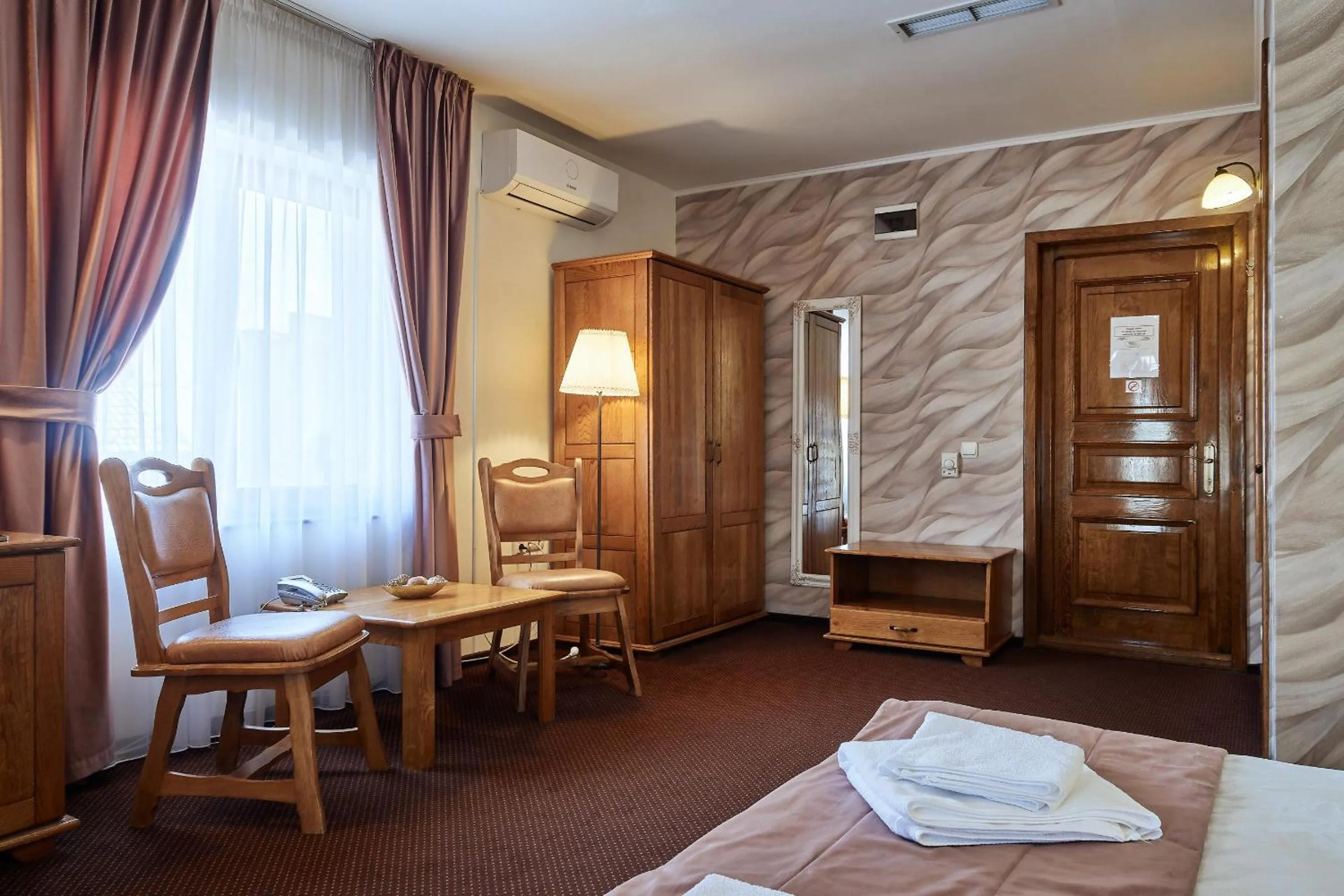 Bed in Pension La Fontana