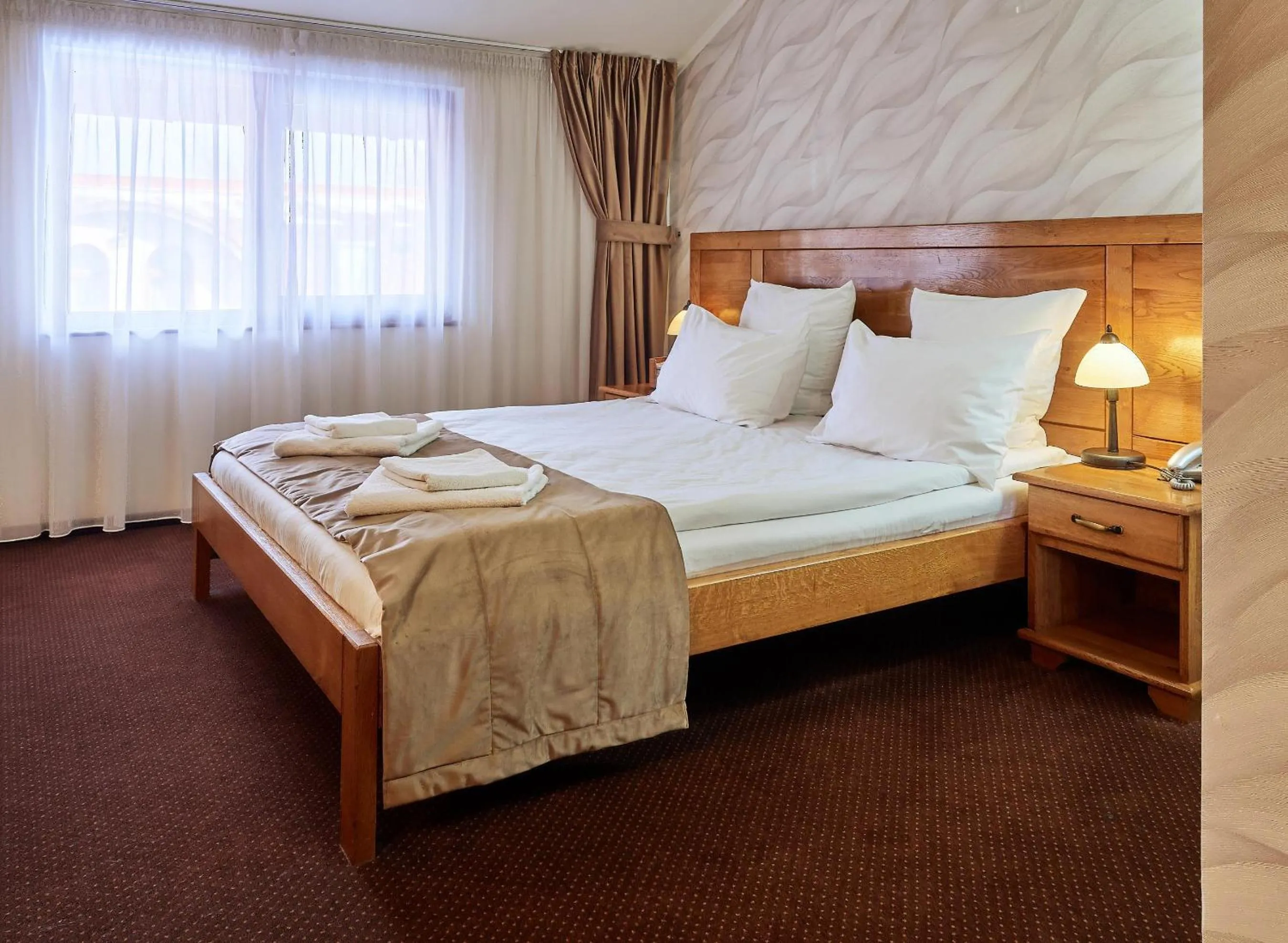 Bed in Pension La Fontana