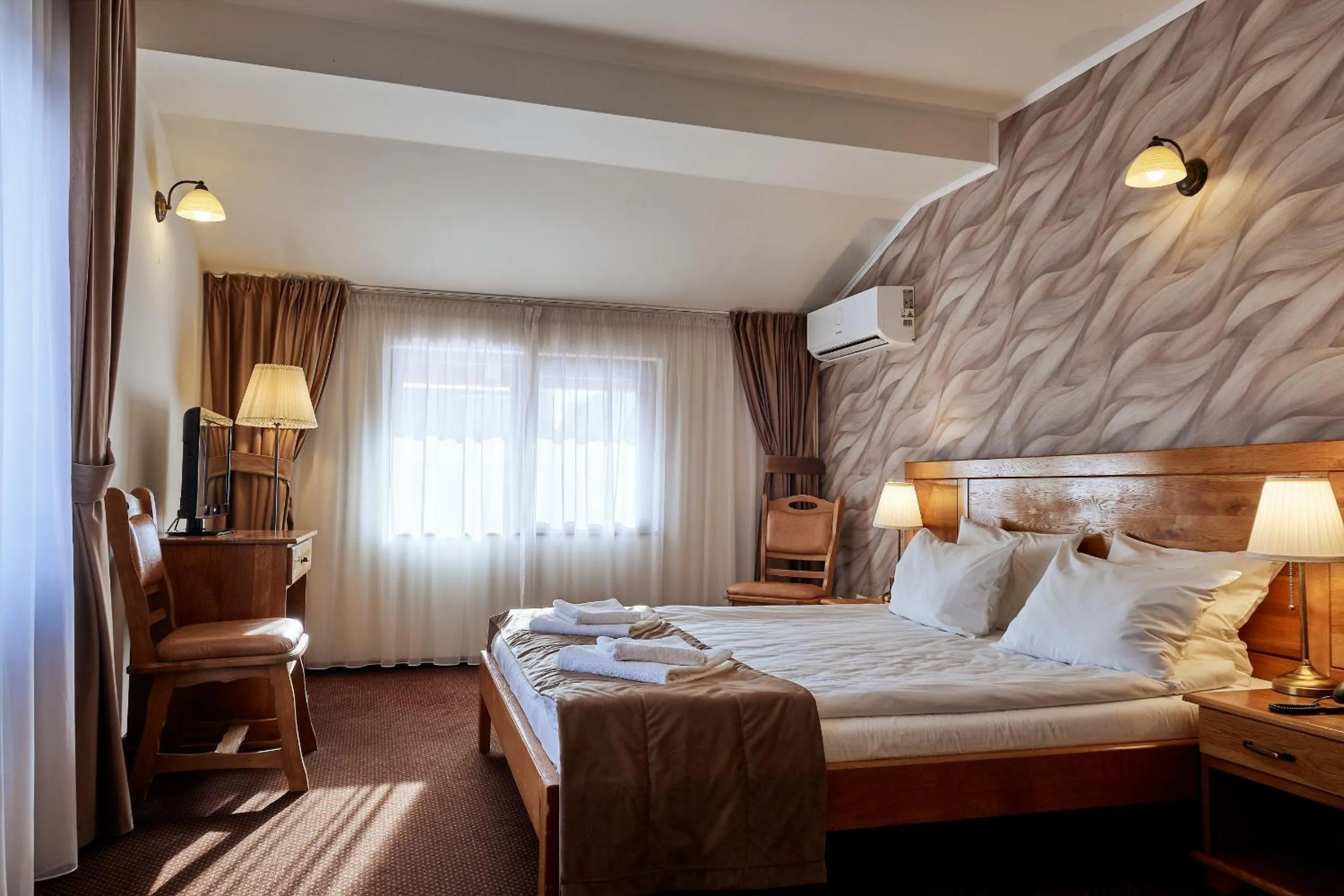 Bed in Pension La Fontana