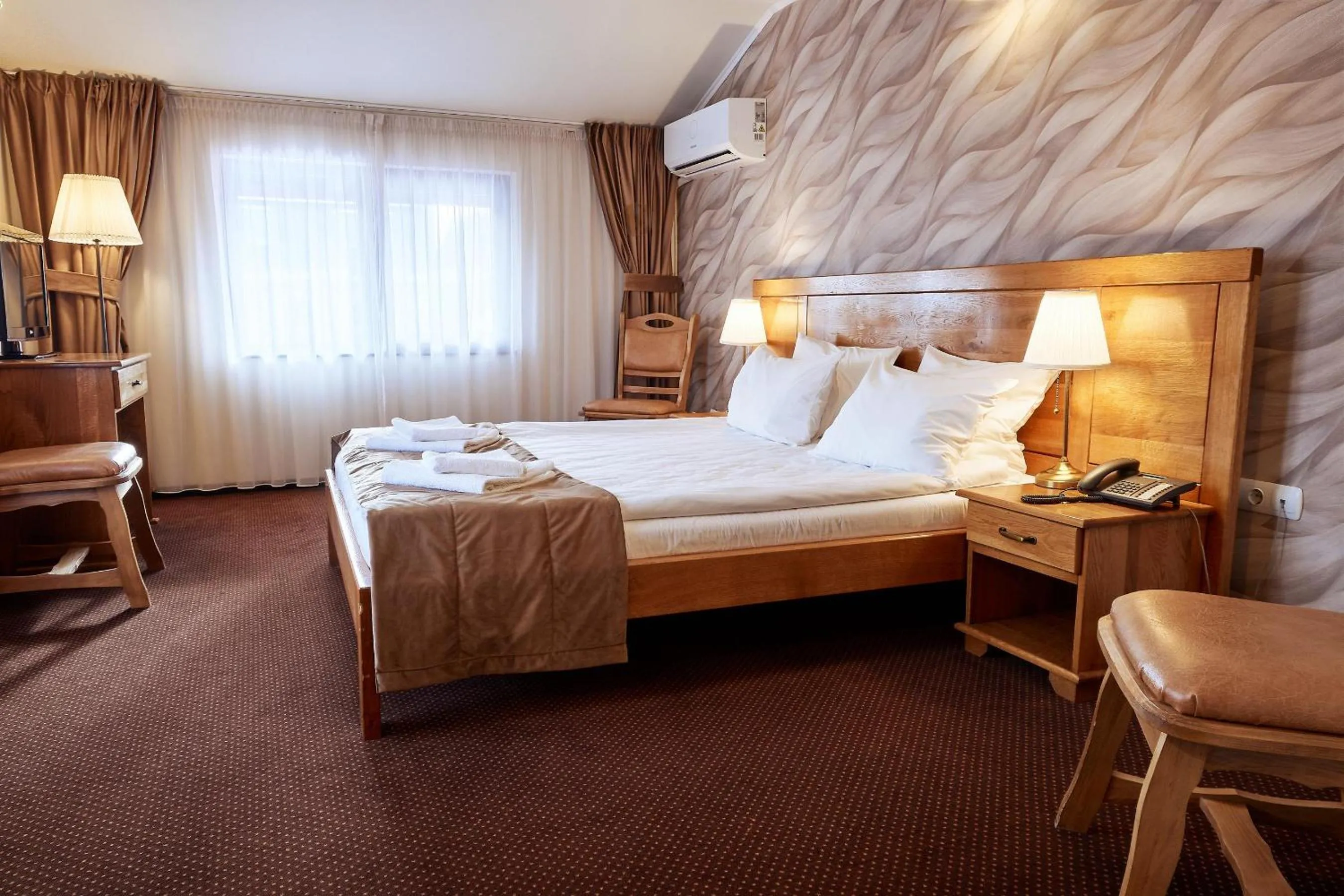 Bed in Pension La Fontana