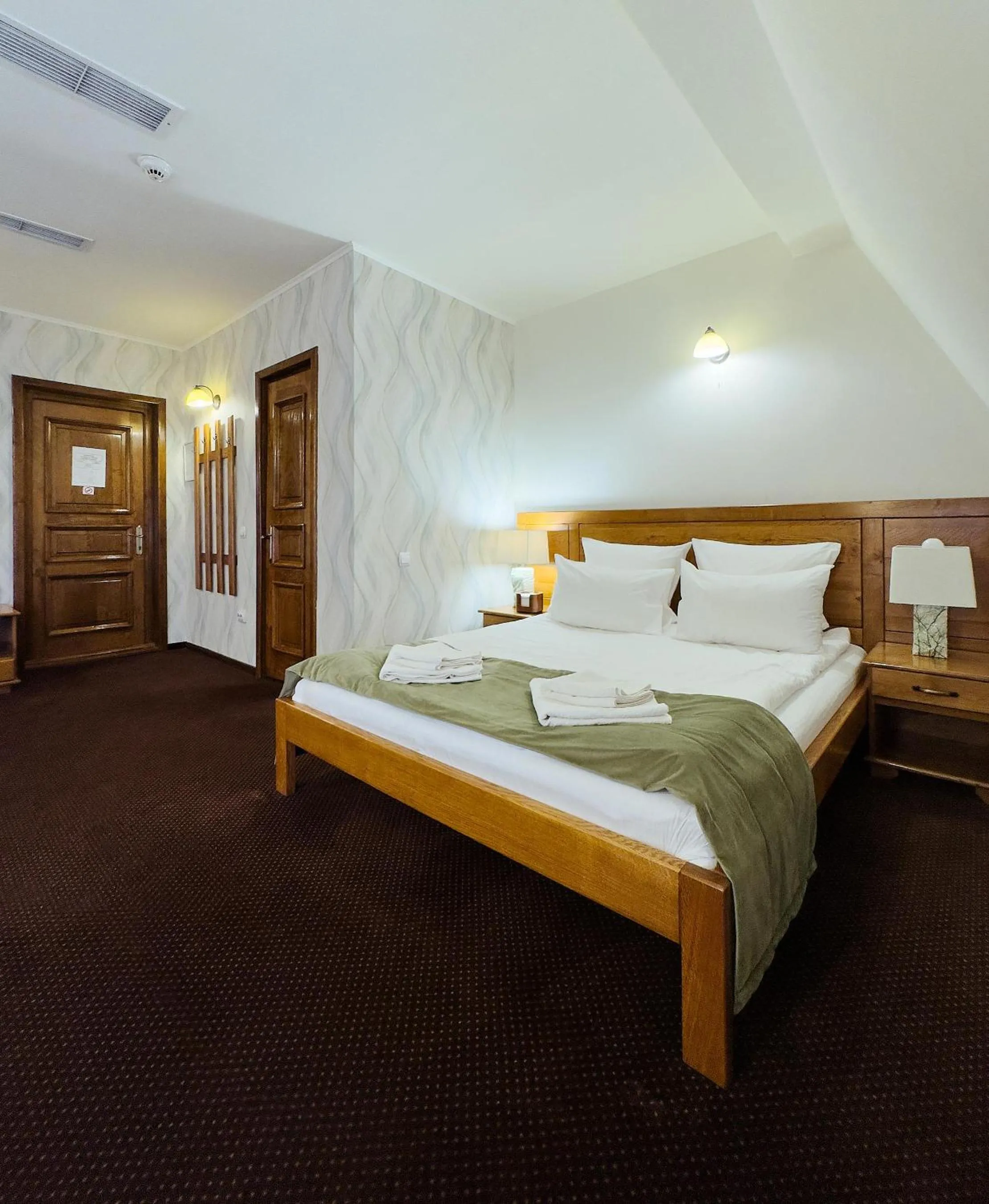 Bed in Pension La Fontana