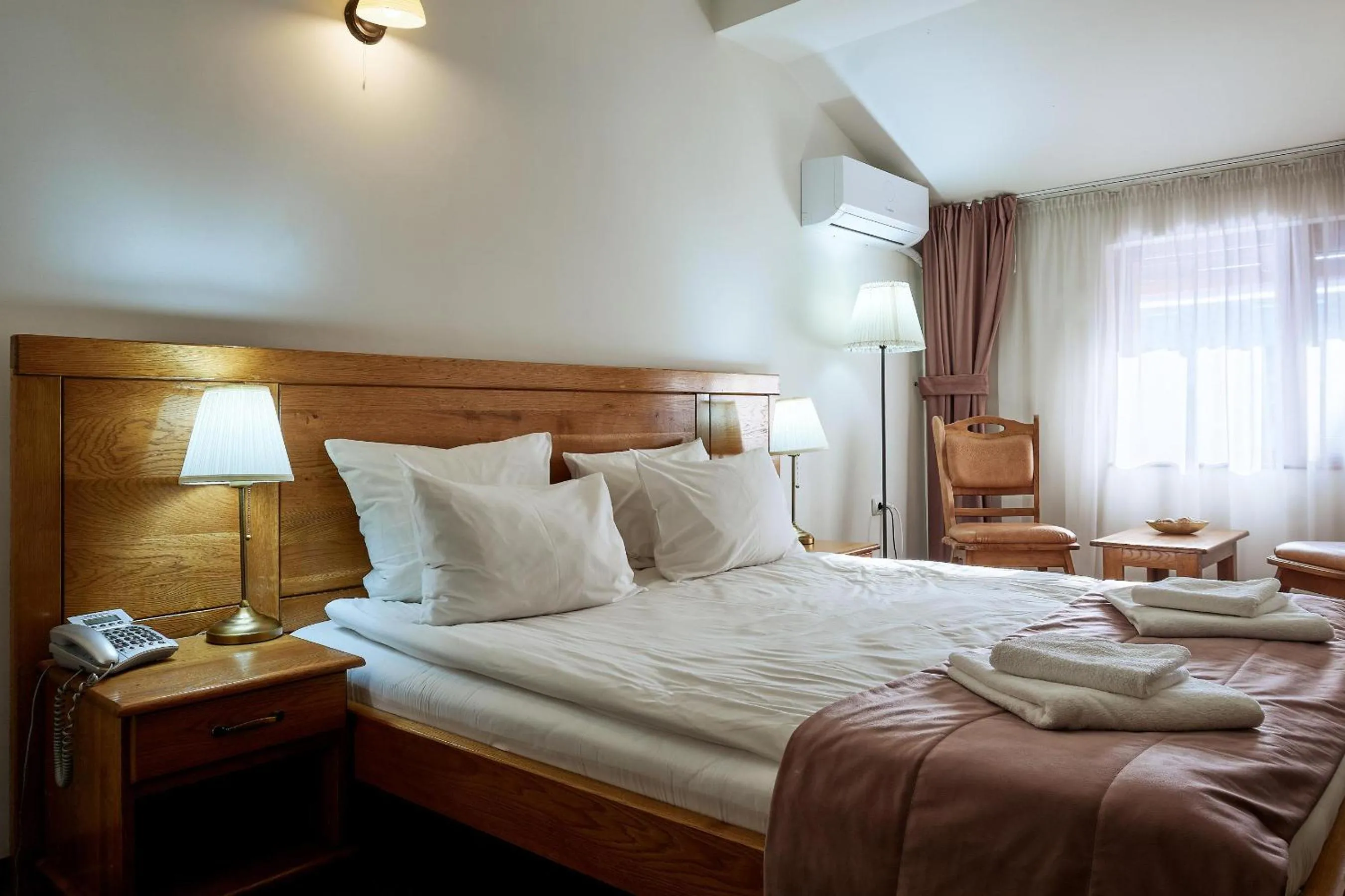 Bed in Pension La Fontana