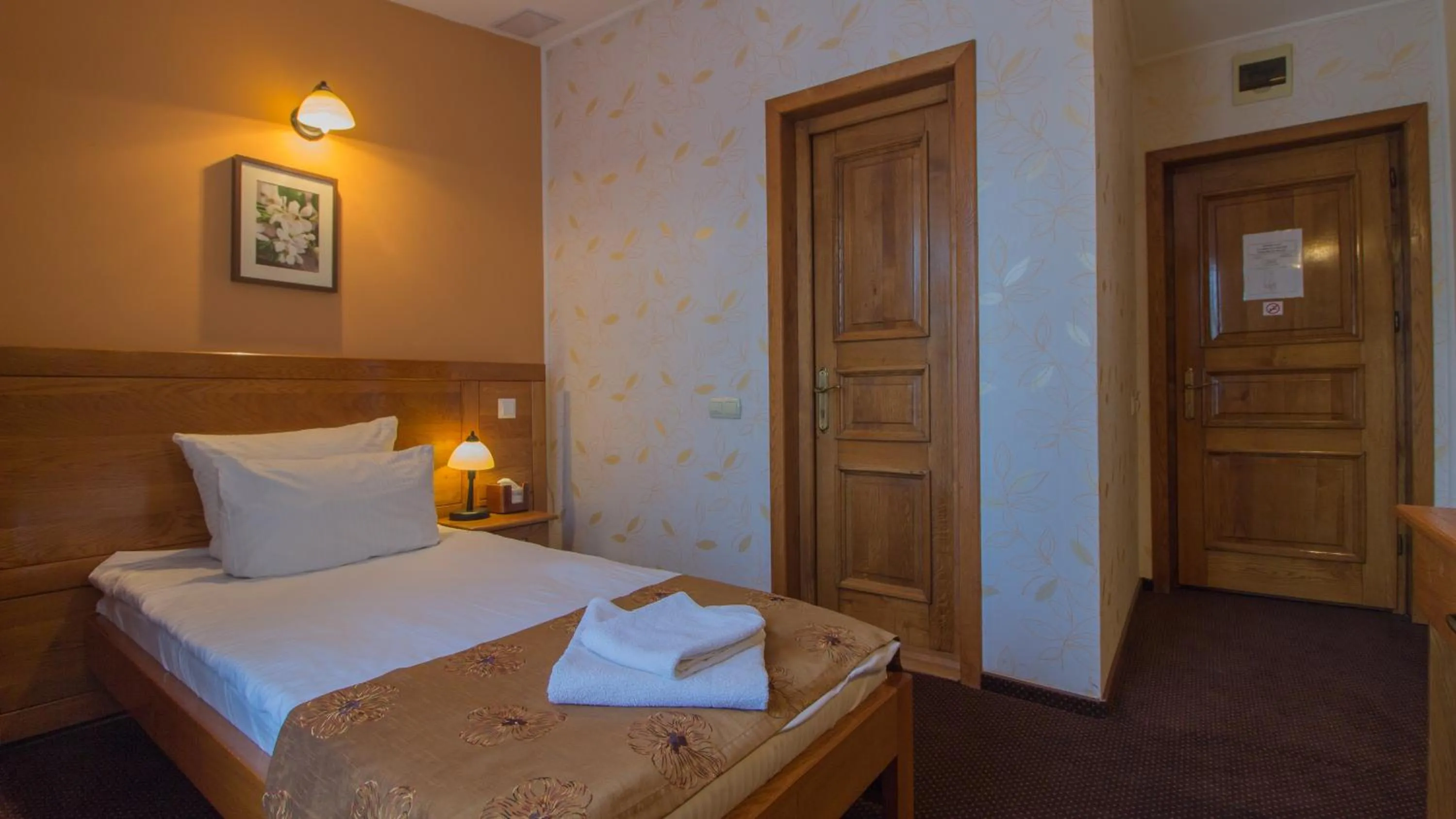 Bed in Pension La Fontana