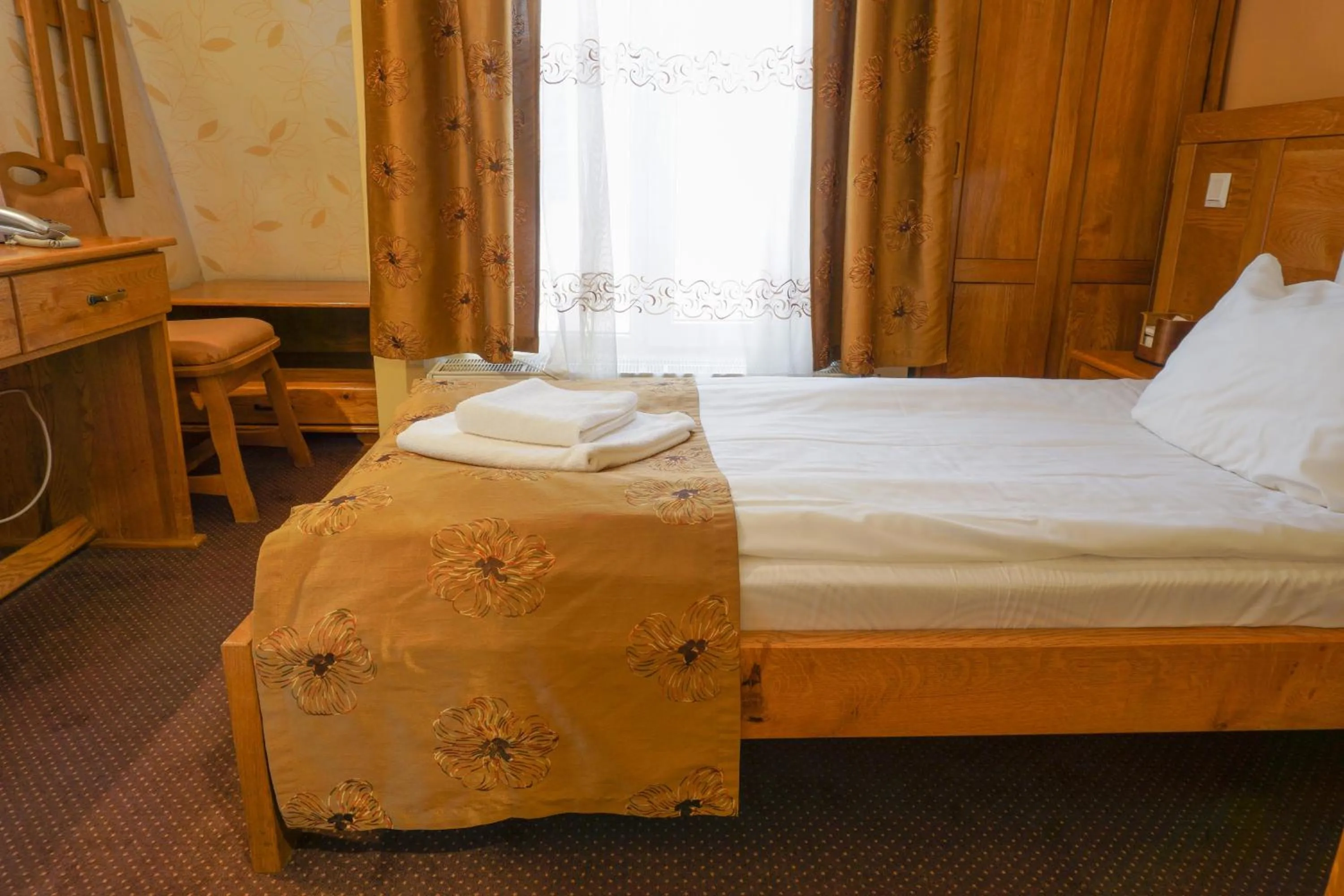Bed in Pension La Fontana