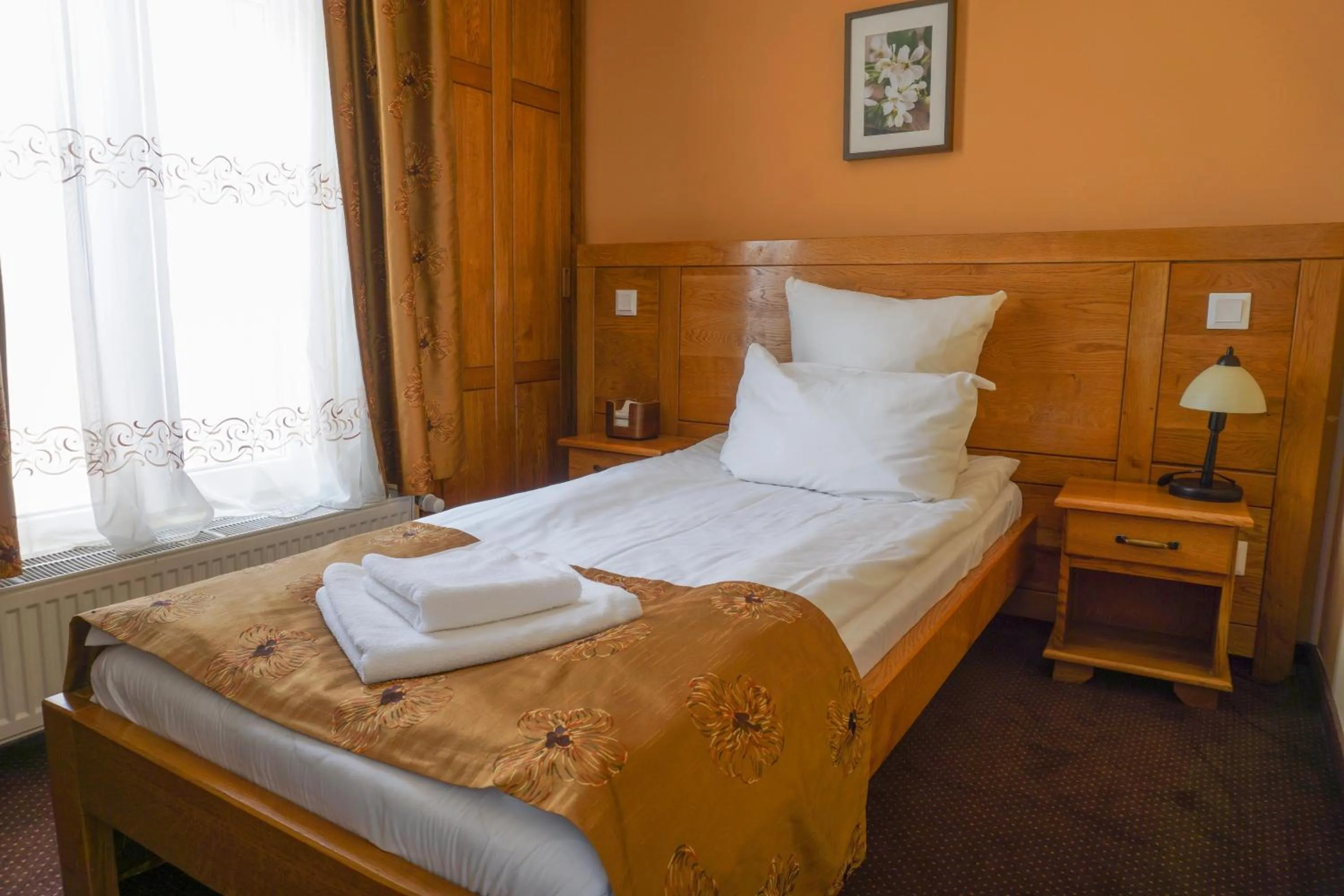 Bed in Pension La Fontana