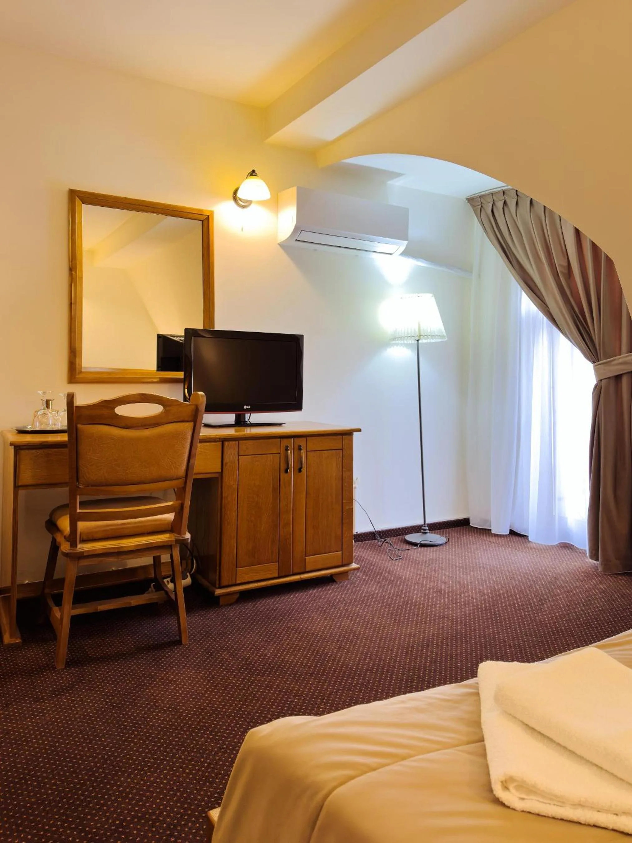 Bed in Pension La Fontana