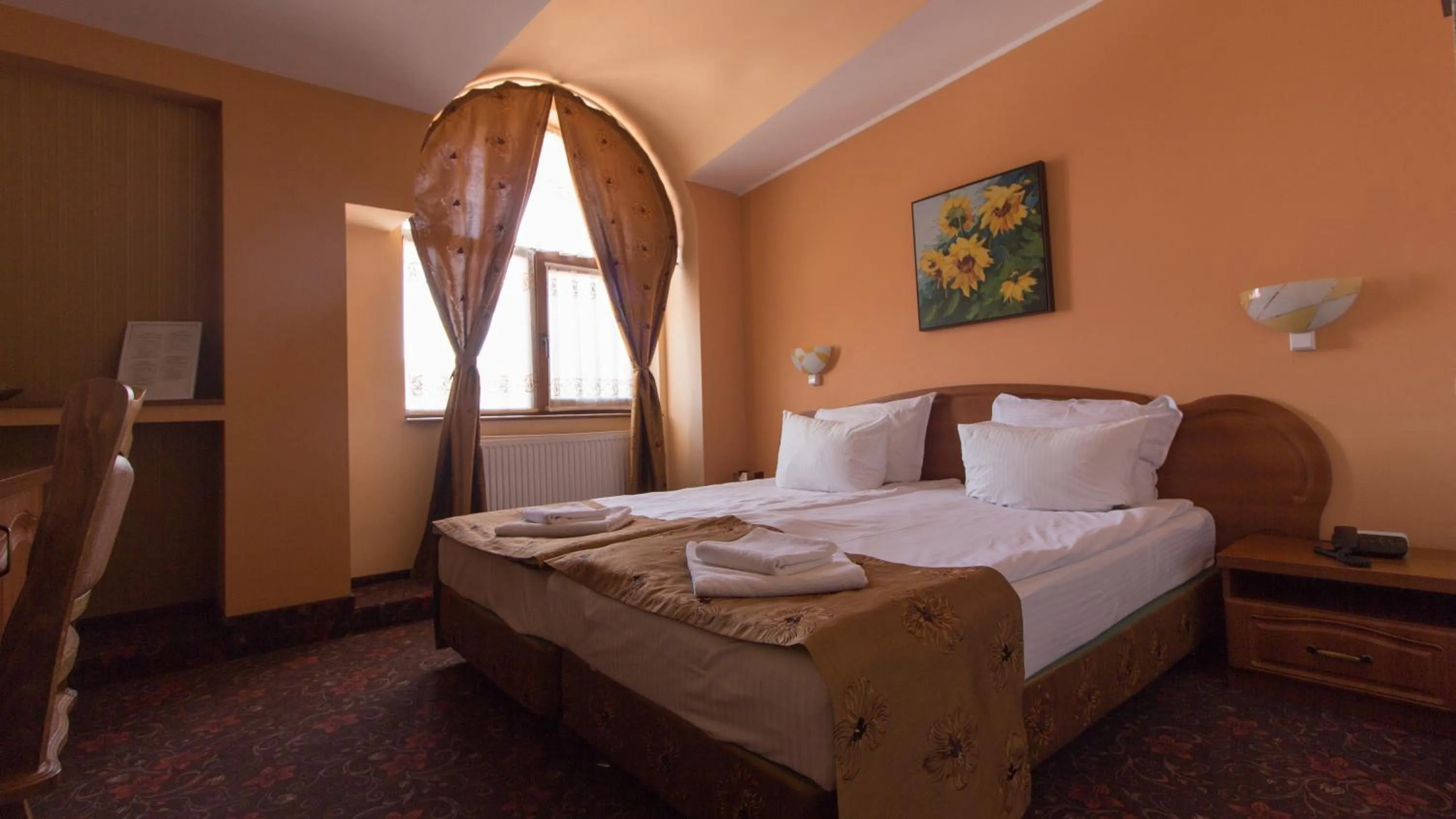 Bed in Pension La Fontana