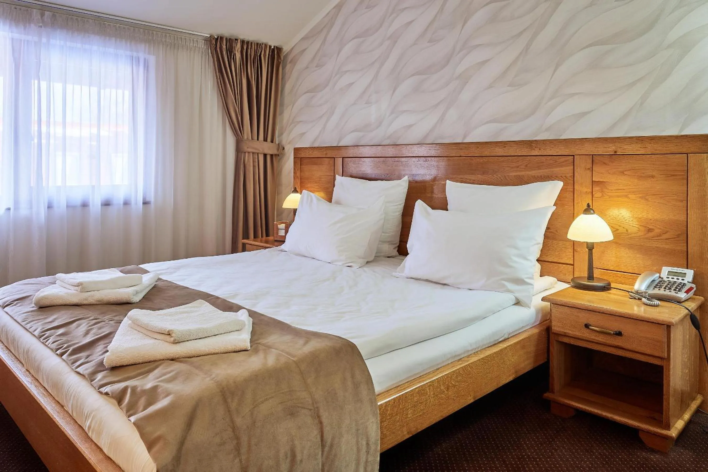 Bed in Pension La Fontana