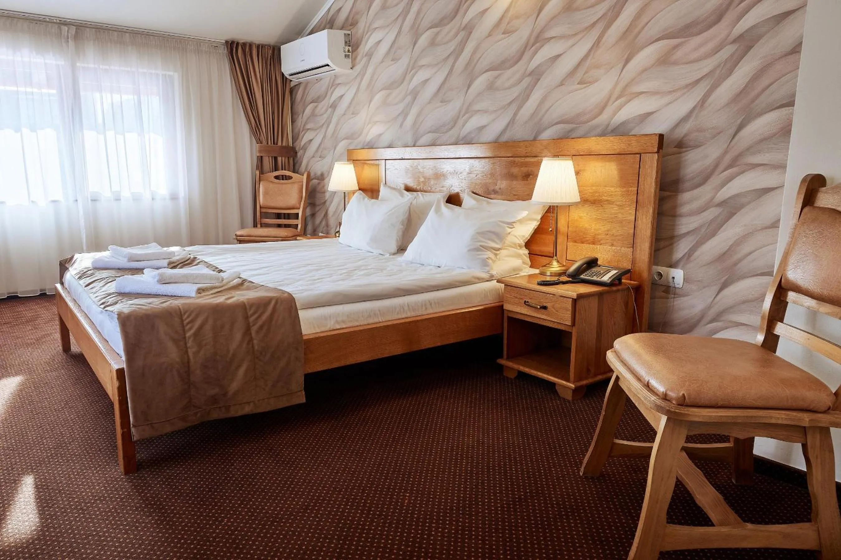 Bed in Pension La Fontana