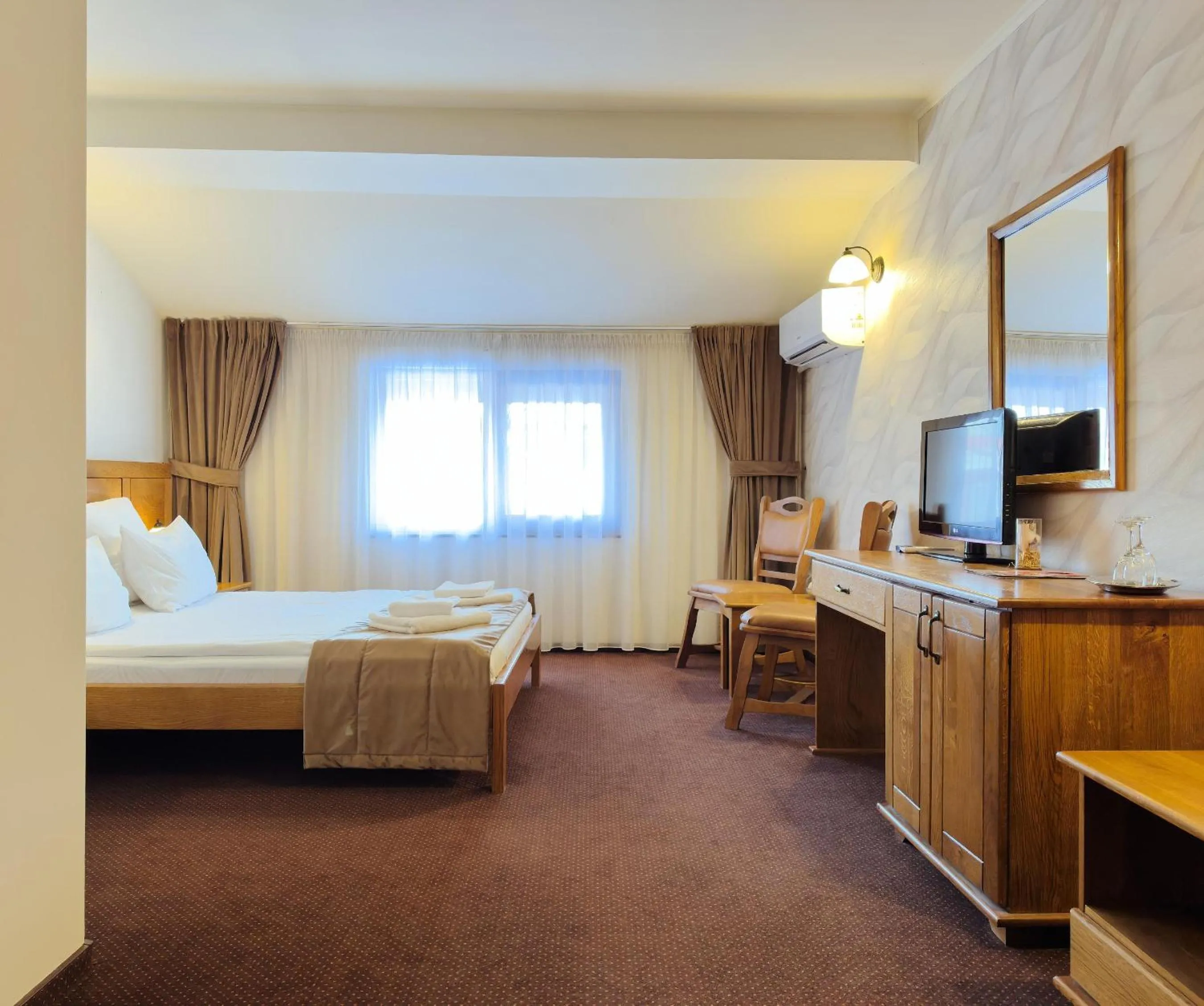 Bed in Pension La Fontana