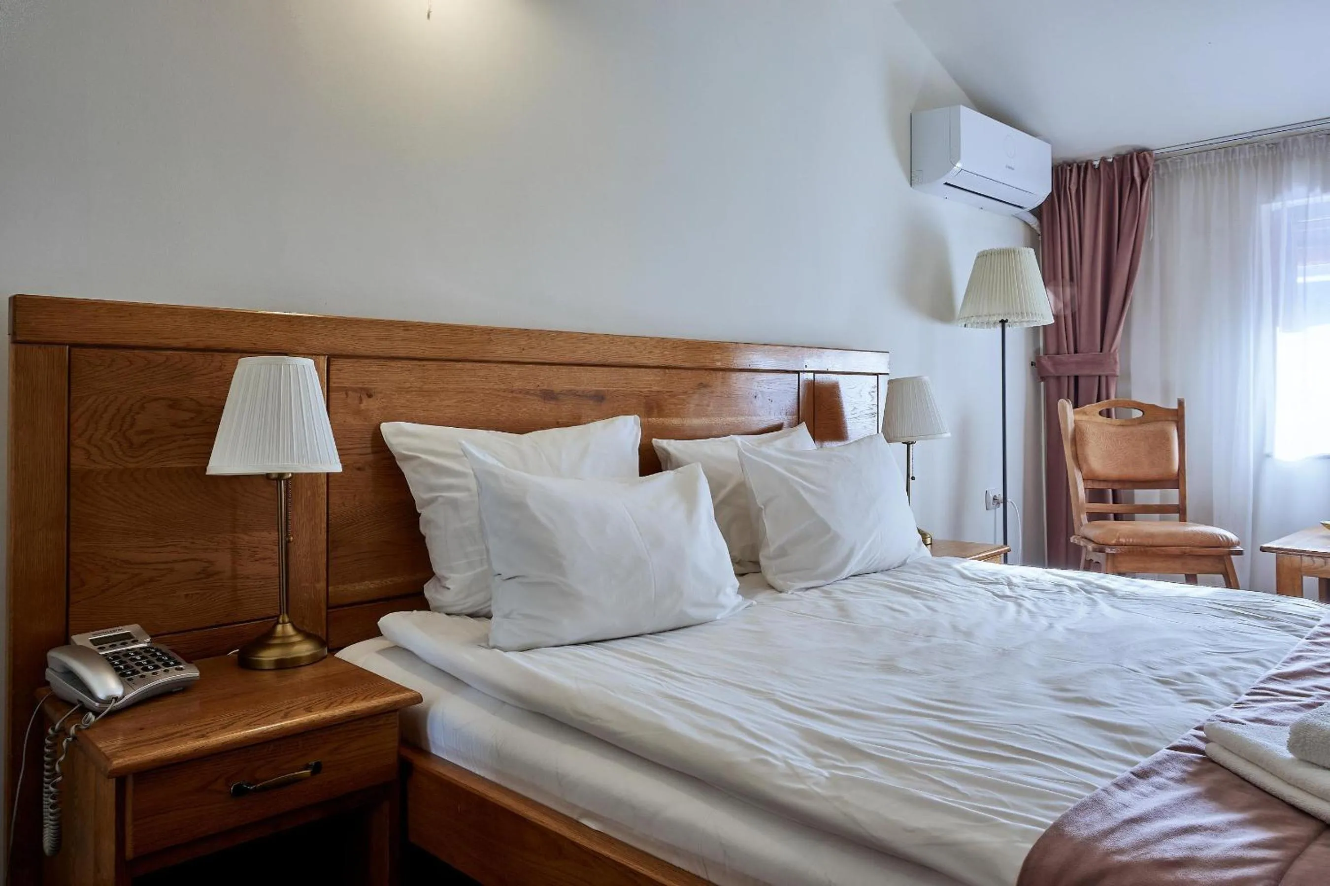 Bed in Pension La Fontana