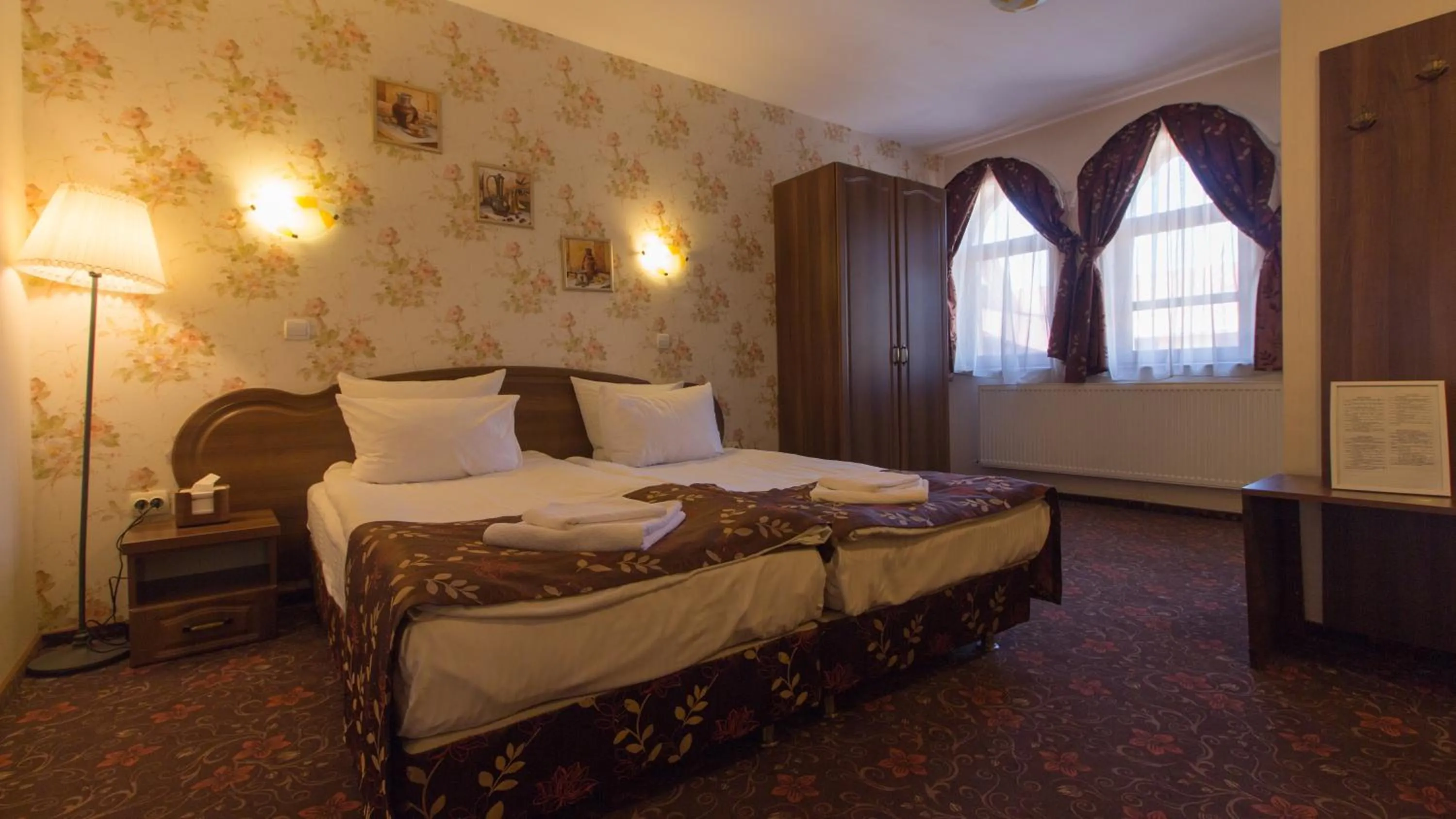 Bed in Pension La Fontana