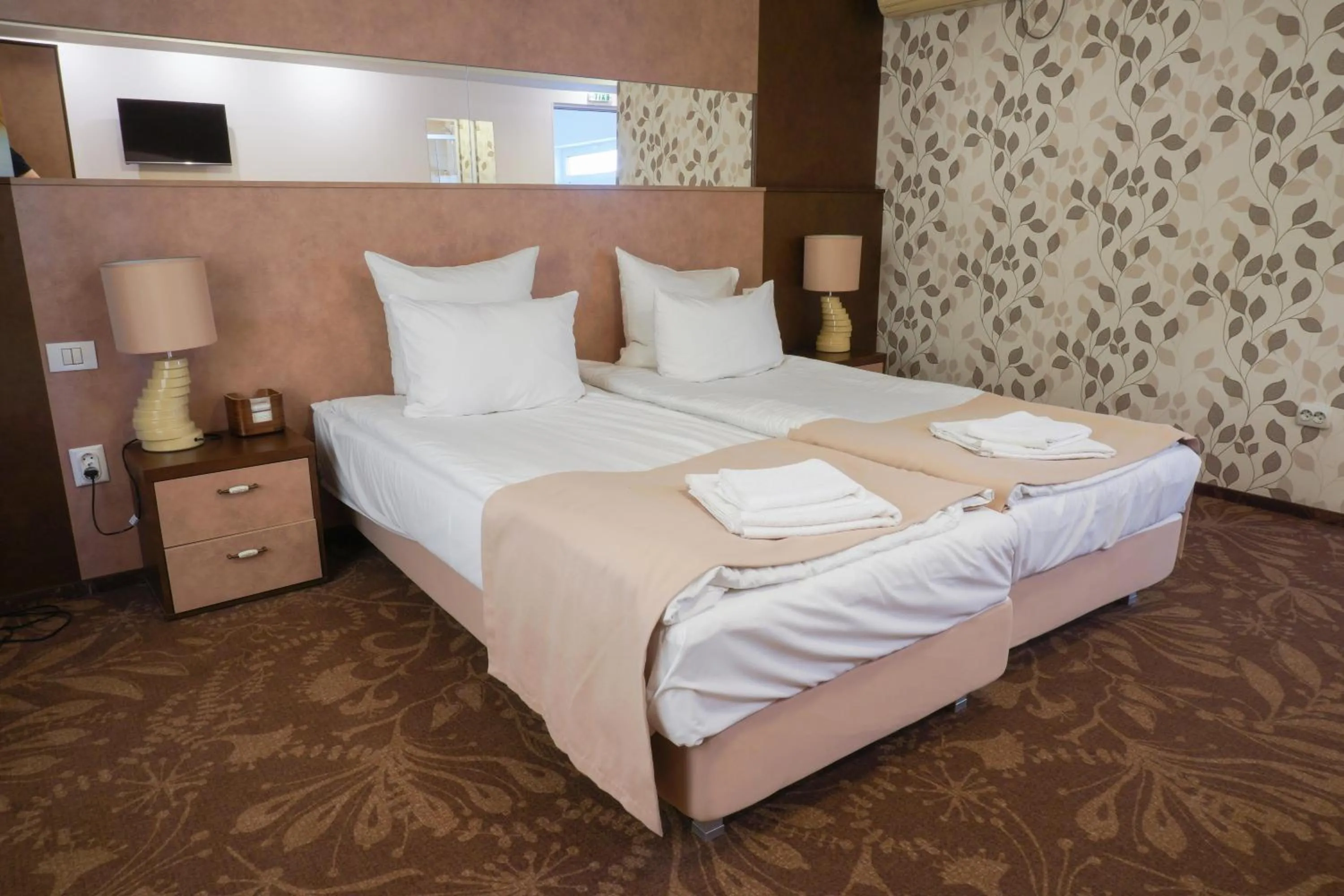 Bed in Pension La Fontana