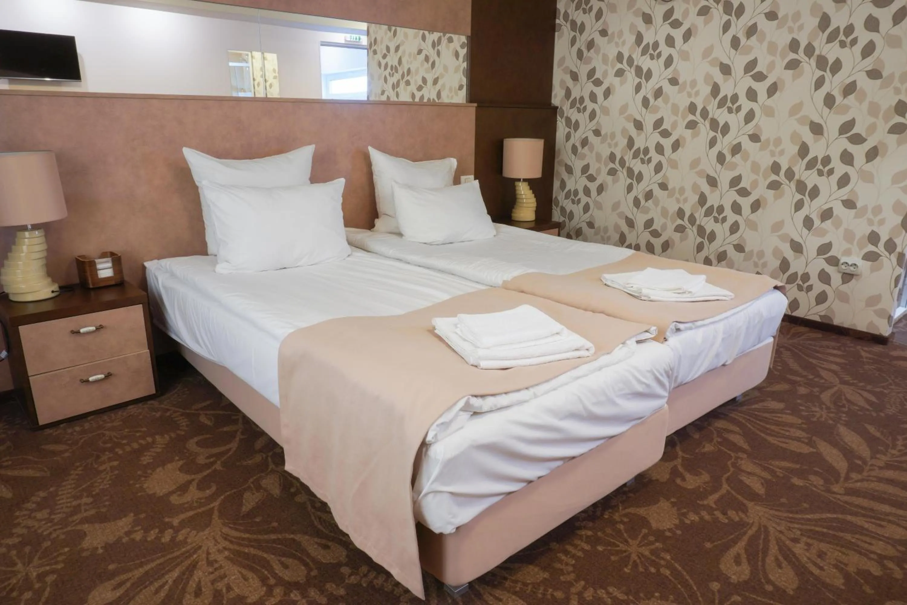 Bed in Pension La Fontana