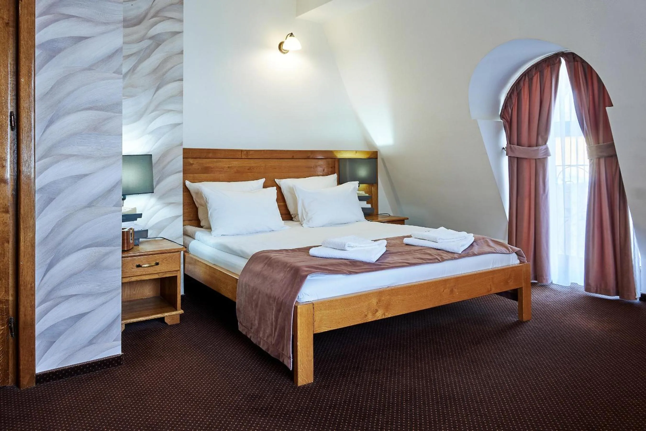 Bed in Pension La Fontana