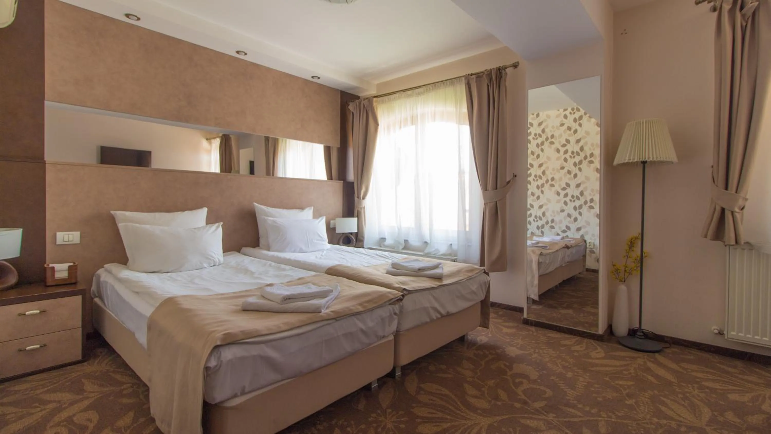 Bed in Pension La Fontana