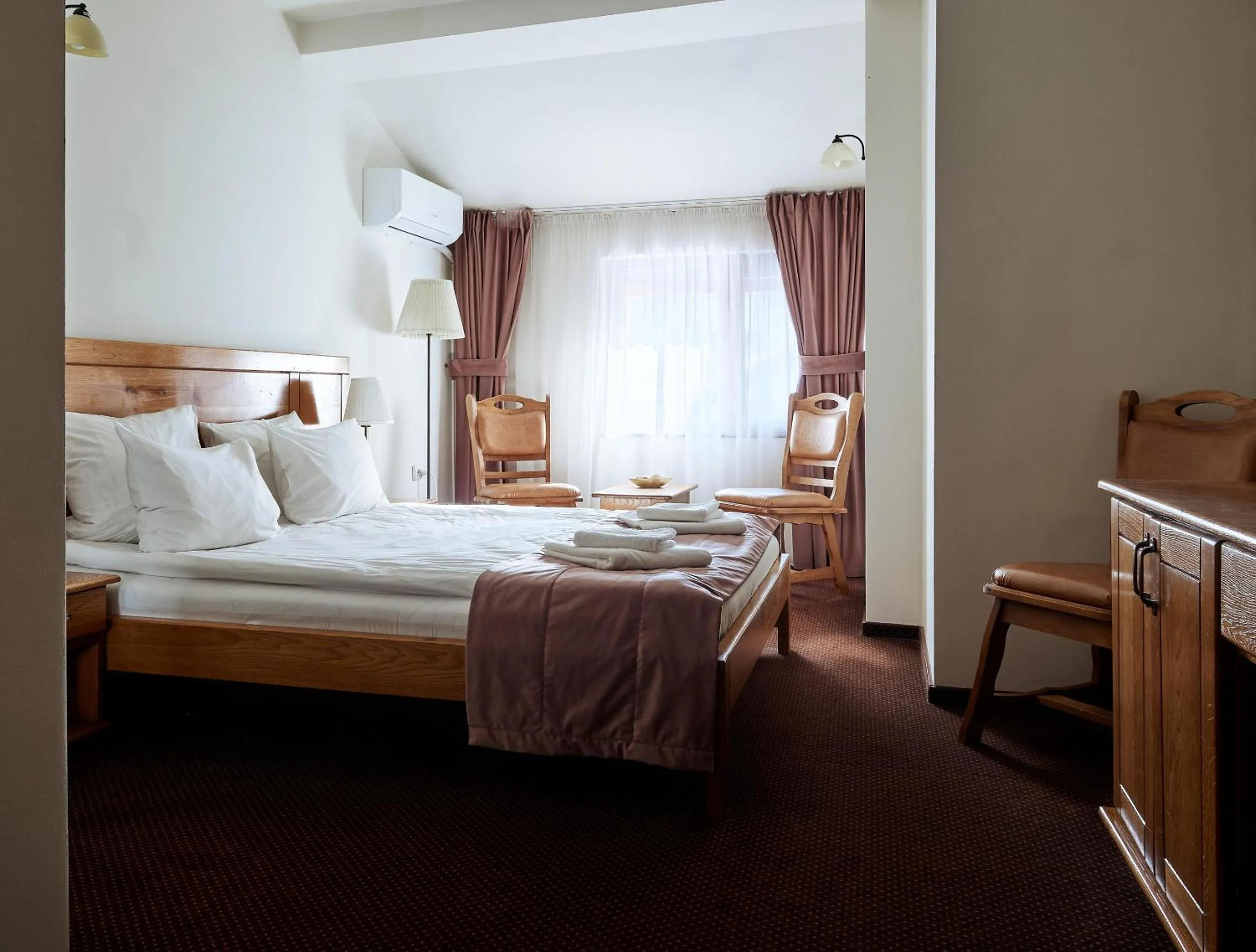 Bed in Pension La Fontana