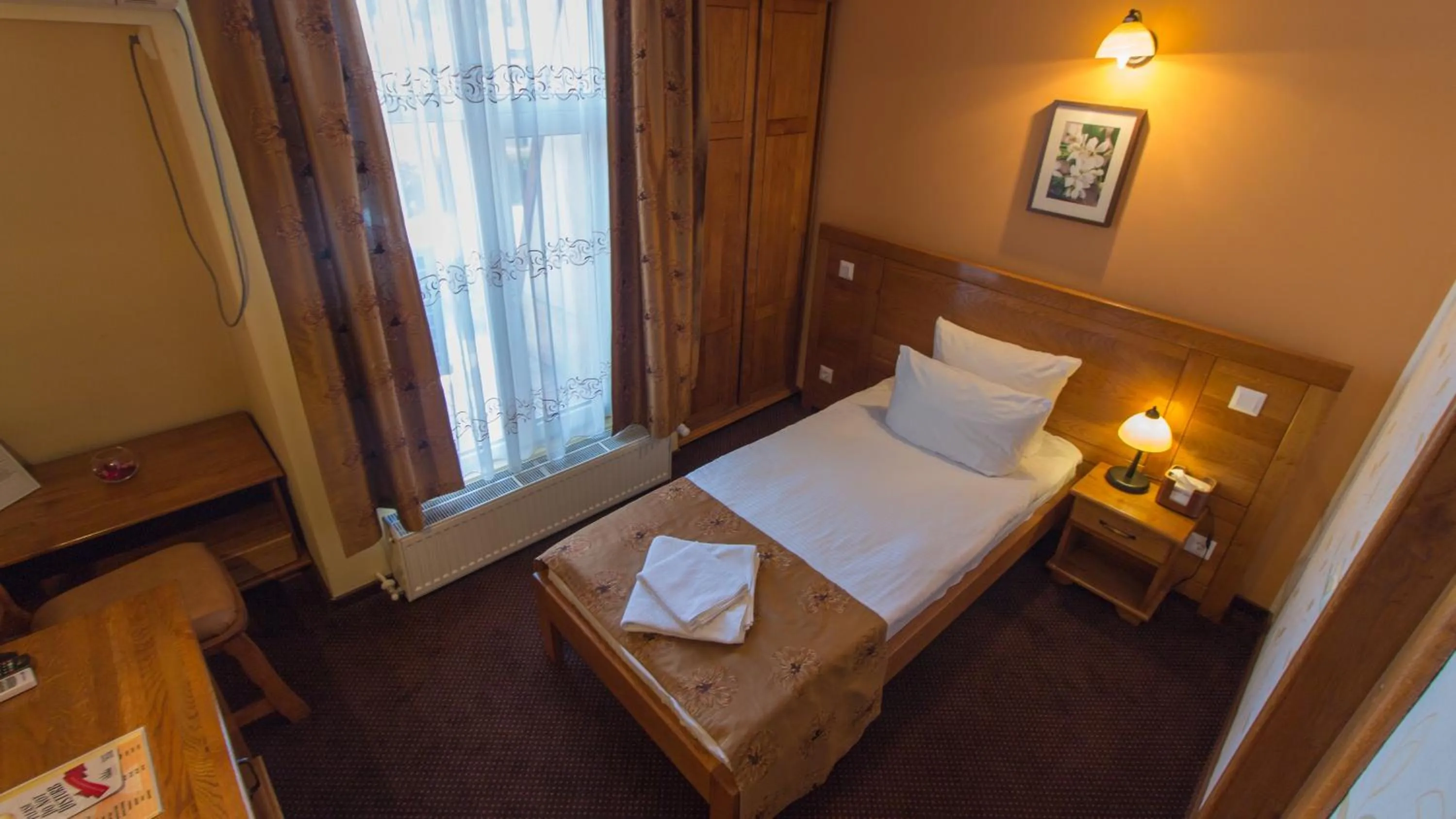 Bed in Pension La Fontana
