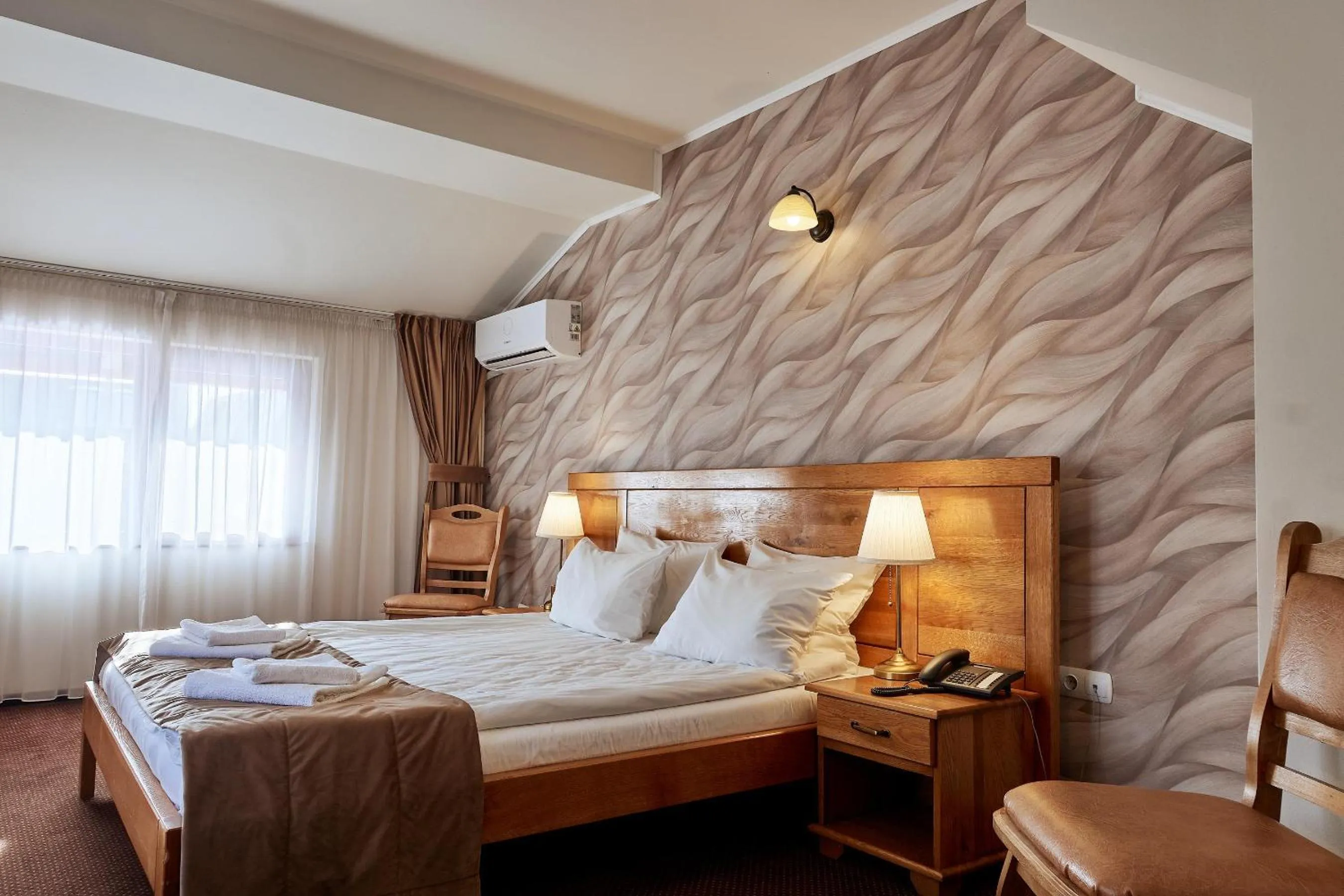 Bed in Pension La Fontana