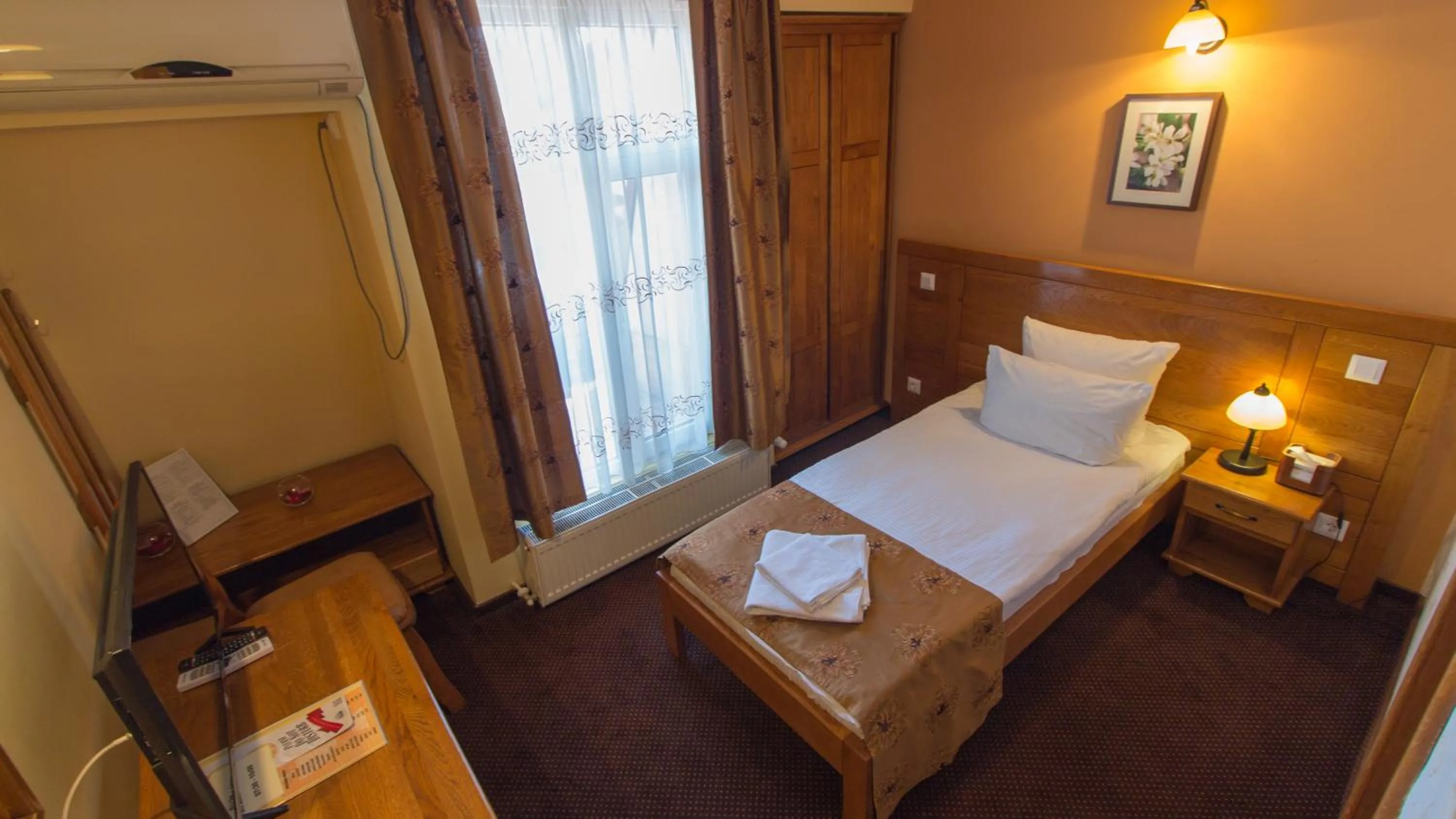 Bed in Pension La Fontana