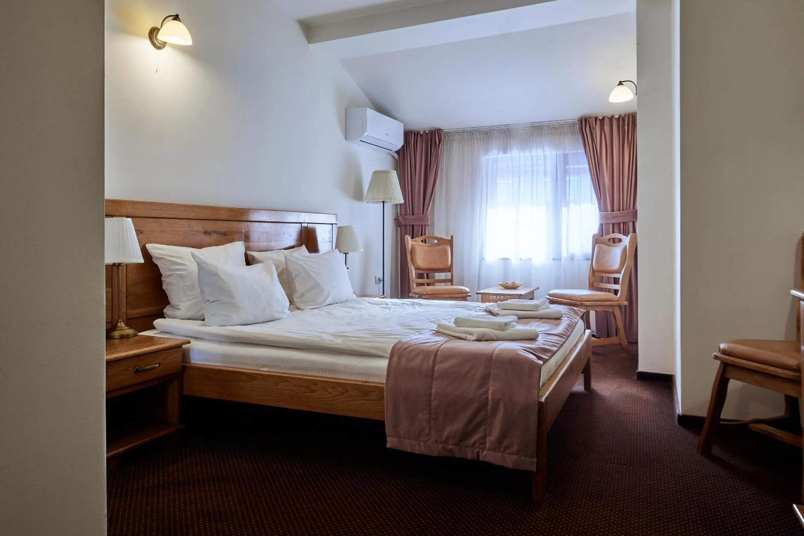 Bed in Pension La Fontana