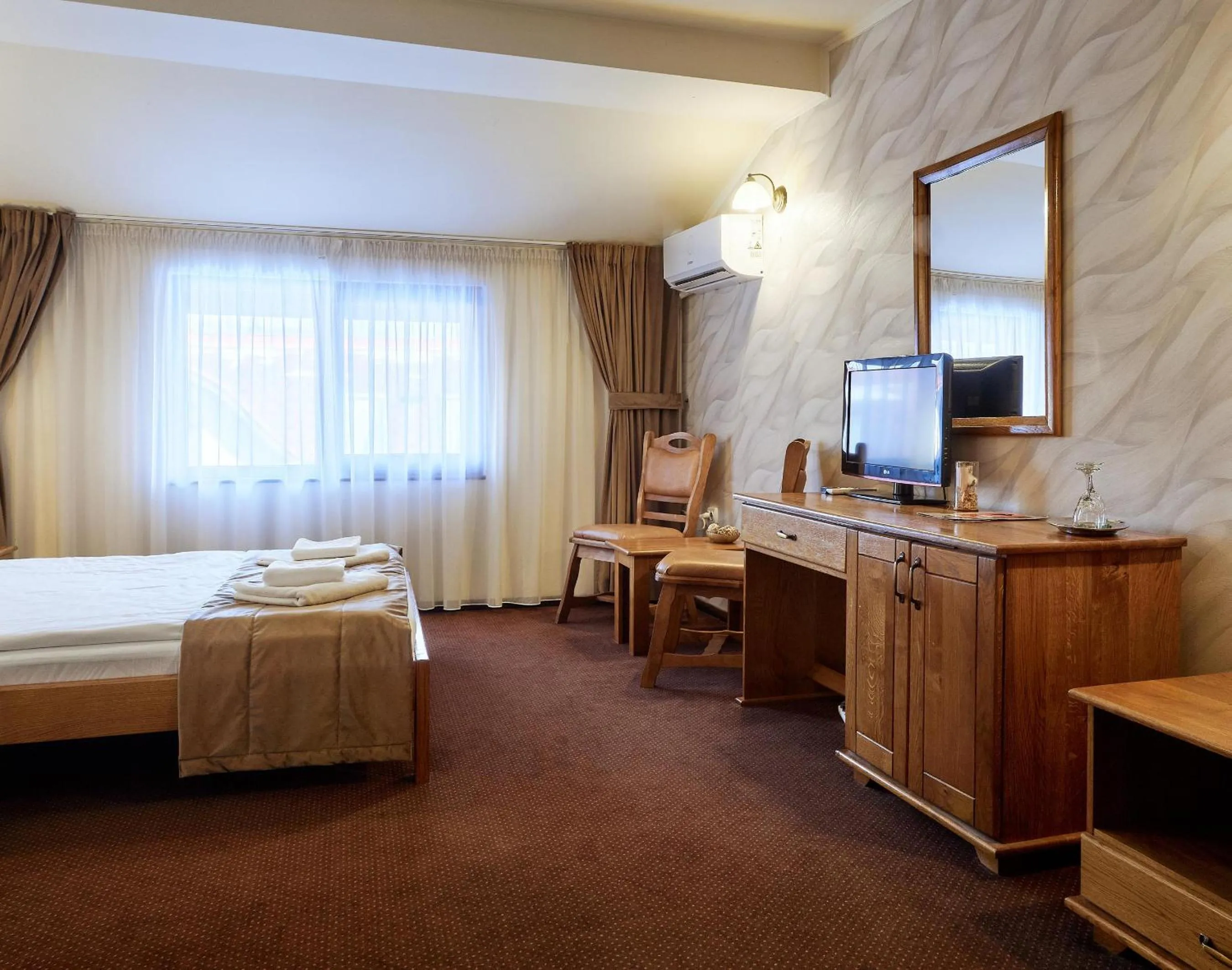 Bed in Pension La Fontana