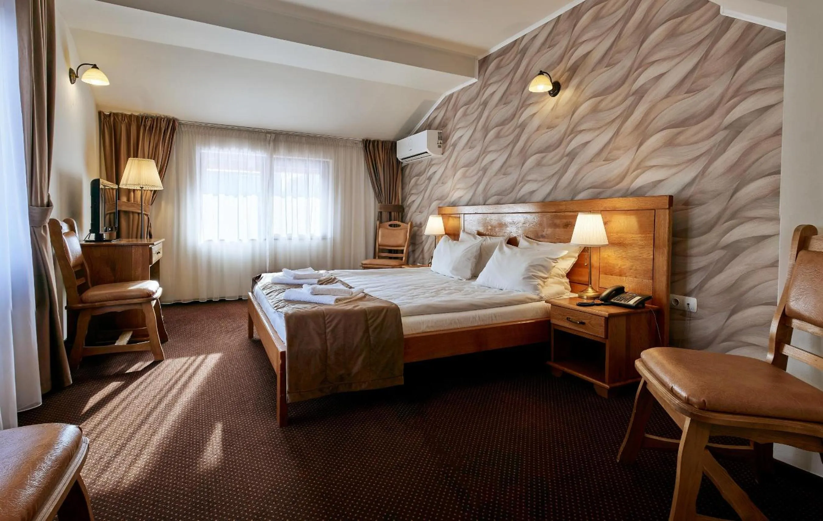 Bed in Pension La Fontana