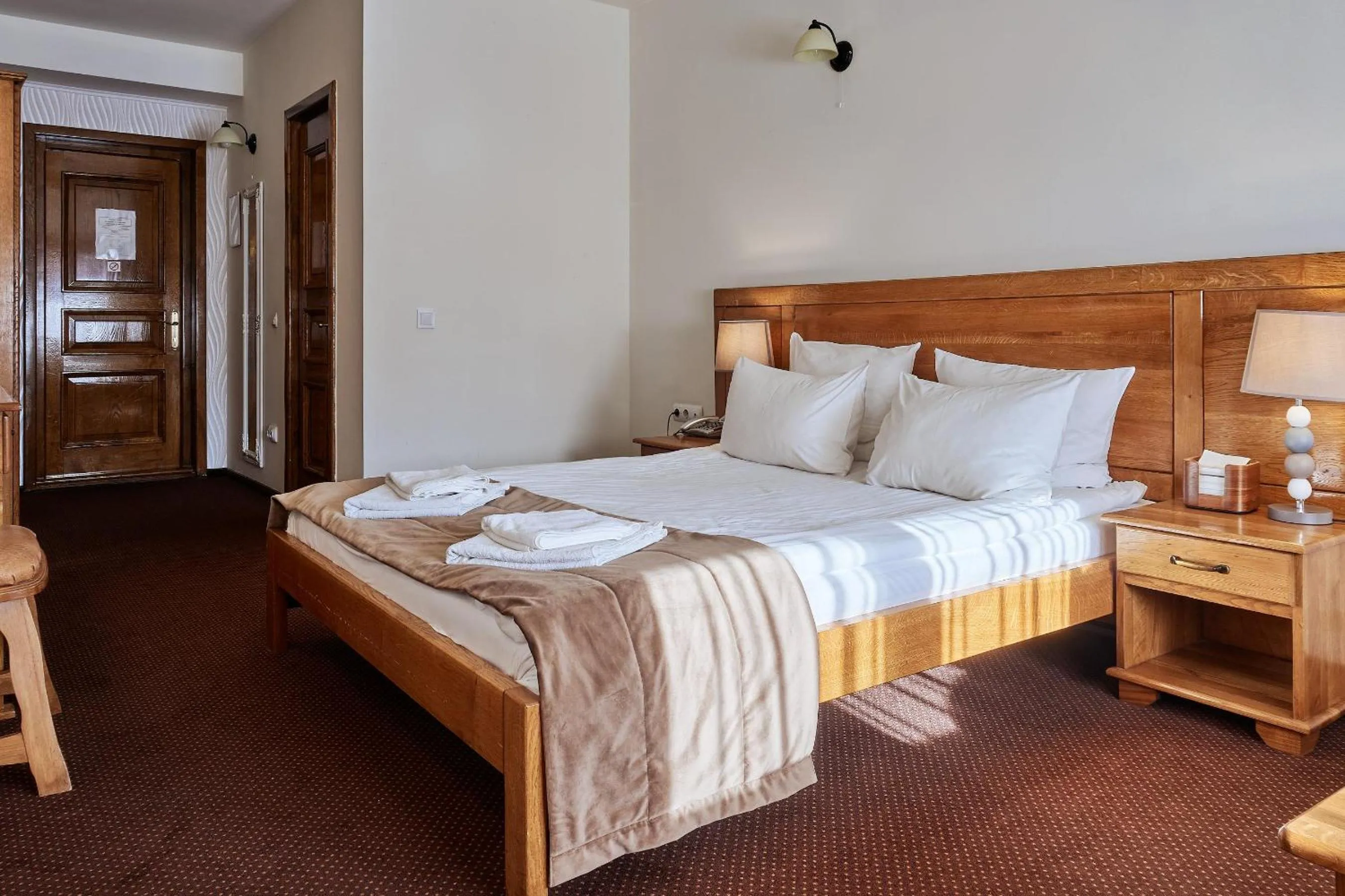 Bed in Pension La Fontana