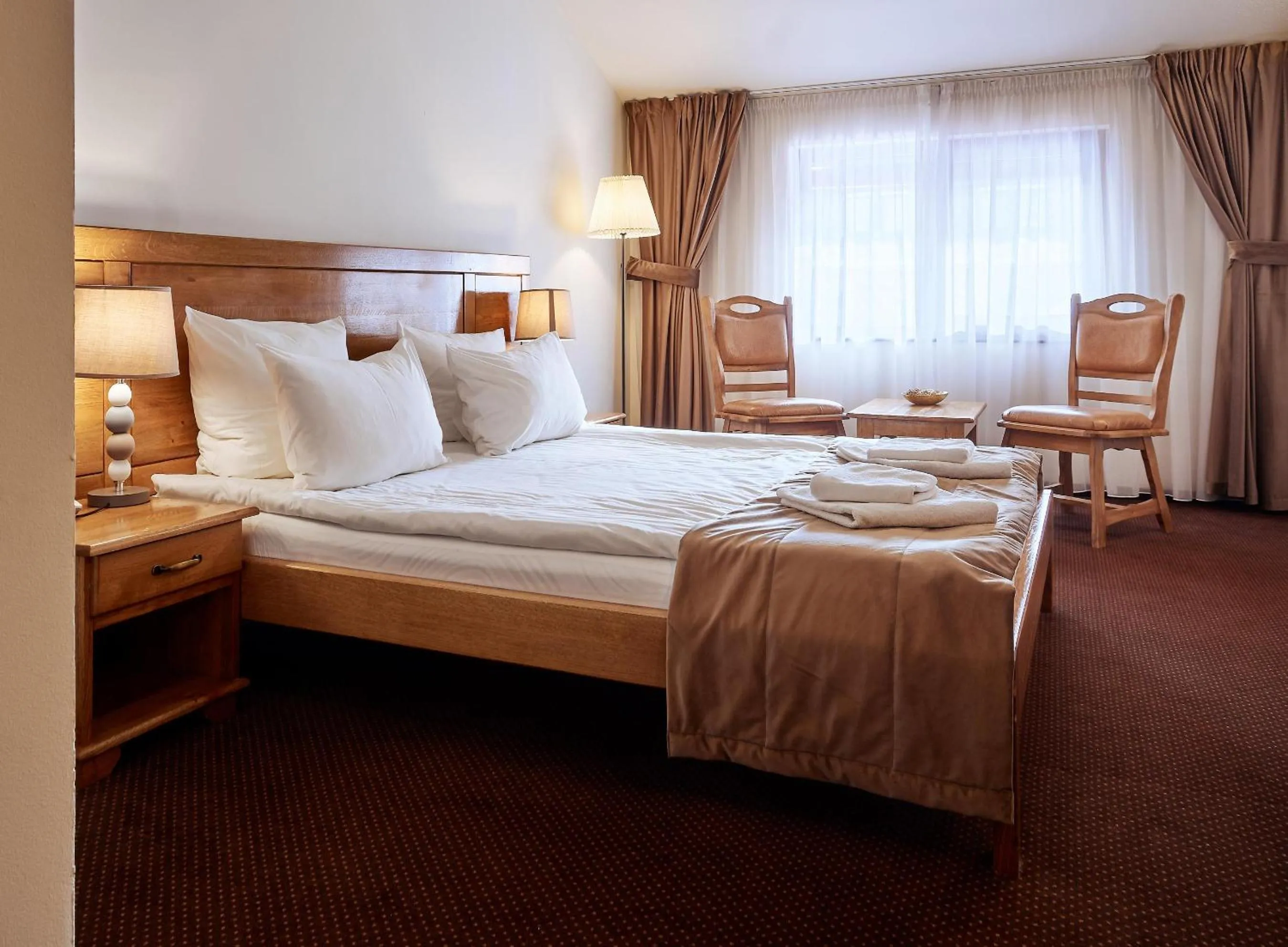 Bed in Pension La Fontana