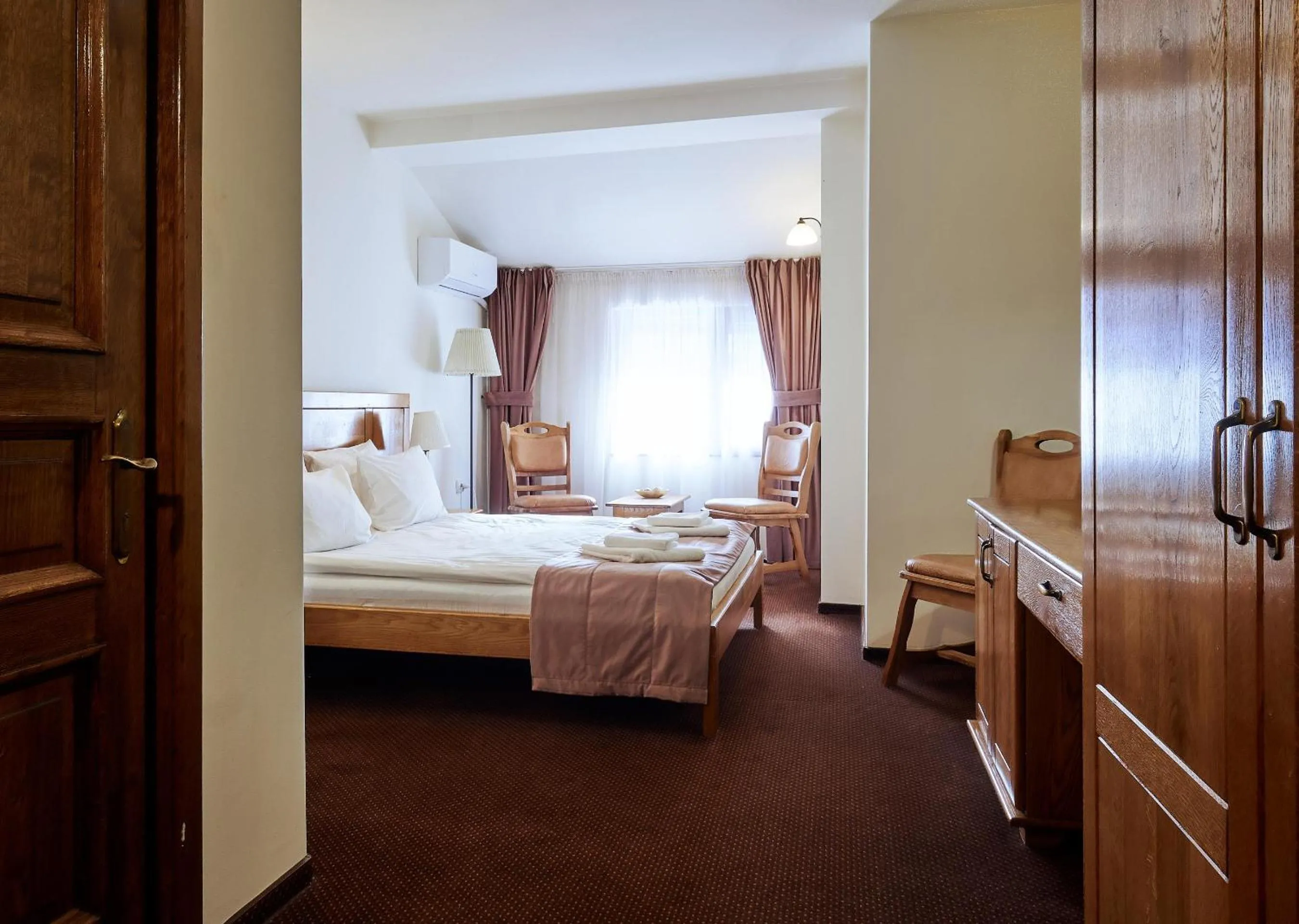 Bed in Pension La Fontana