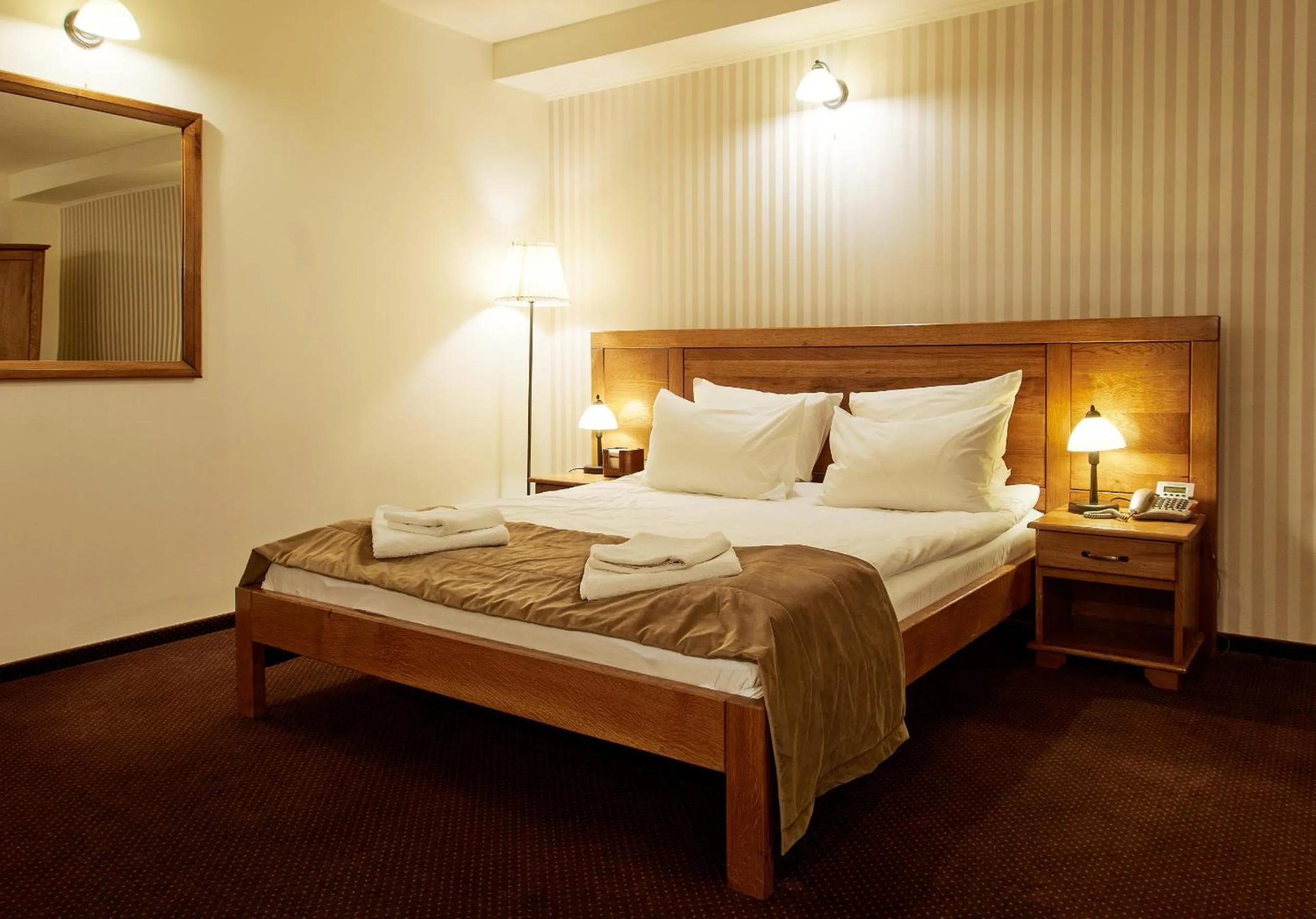 Bed in Pension La Fontana