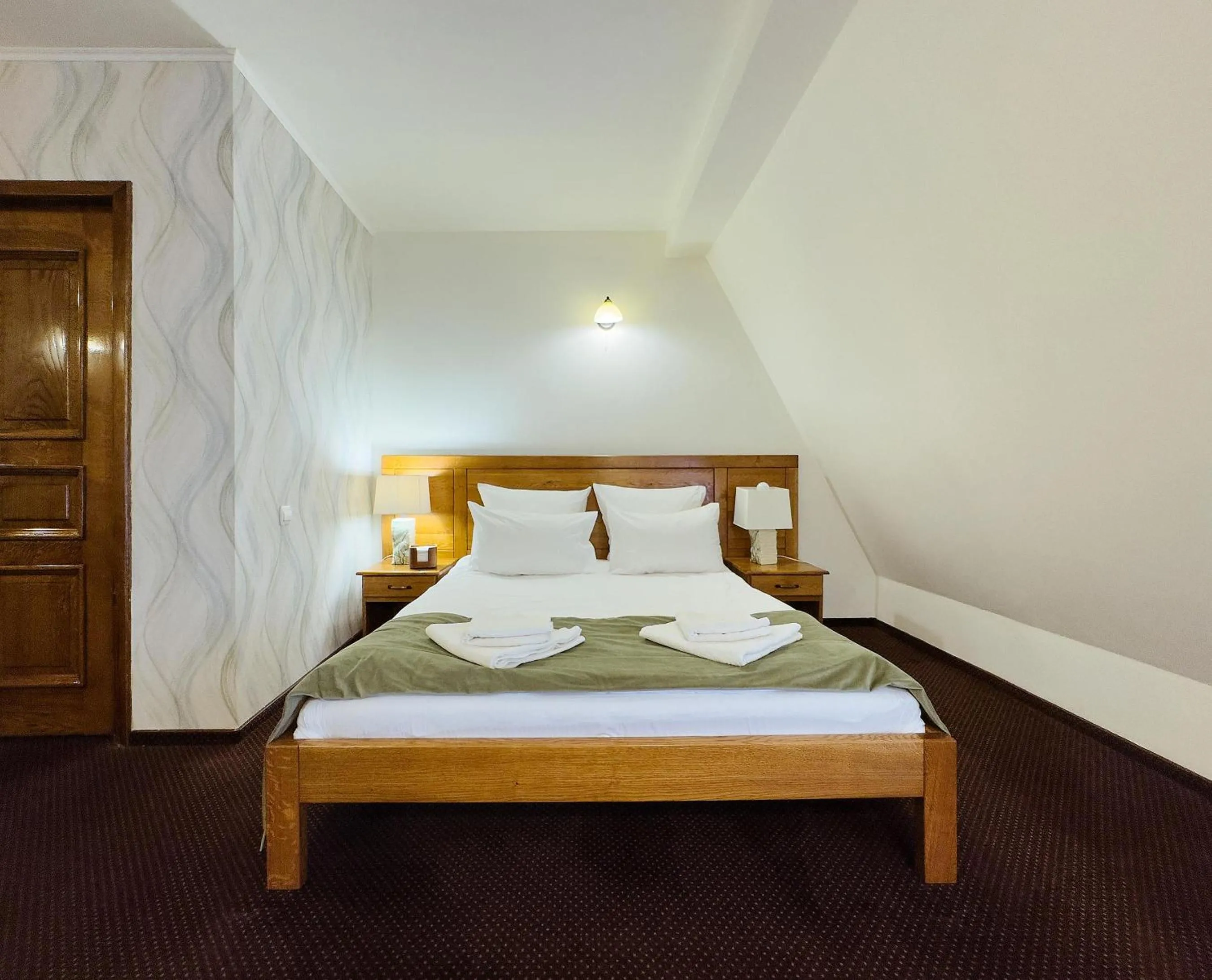 Bed in Pension La Fontana