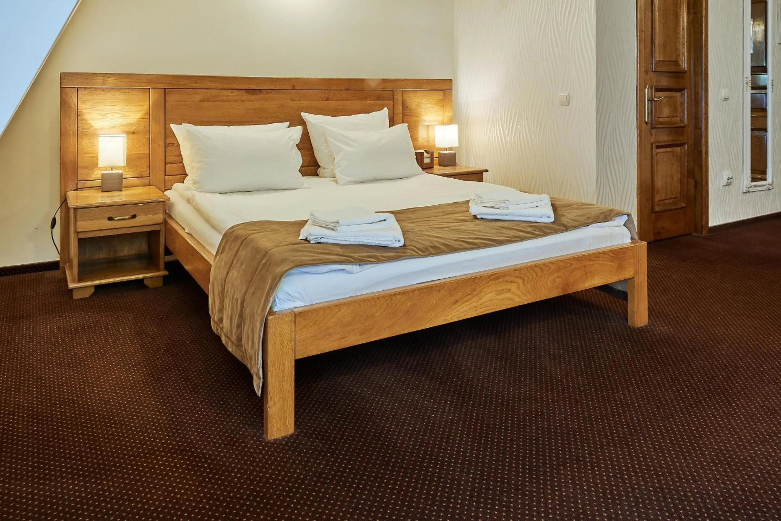 Bed in Pension La Fontana