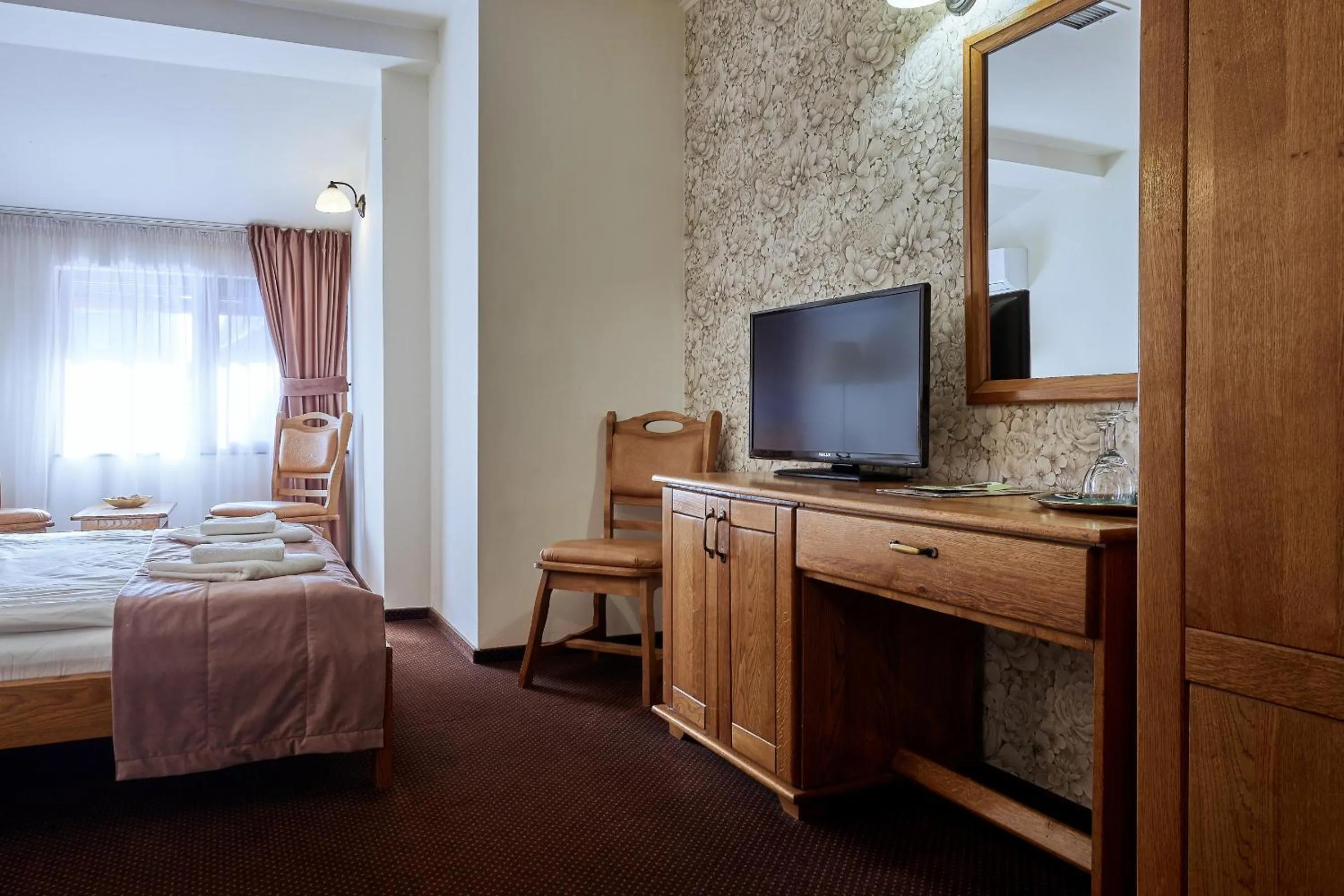 Bed in Pension La Fontana
