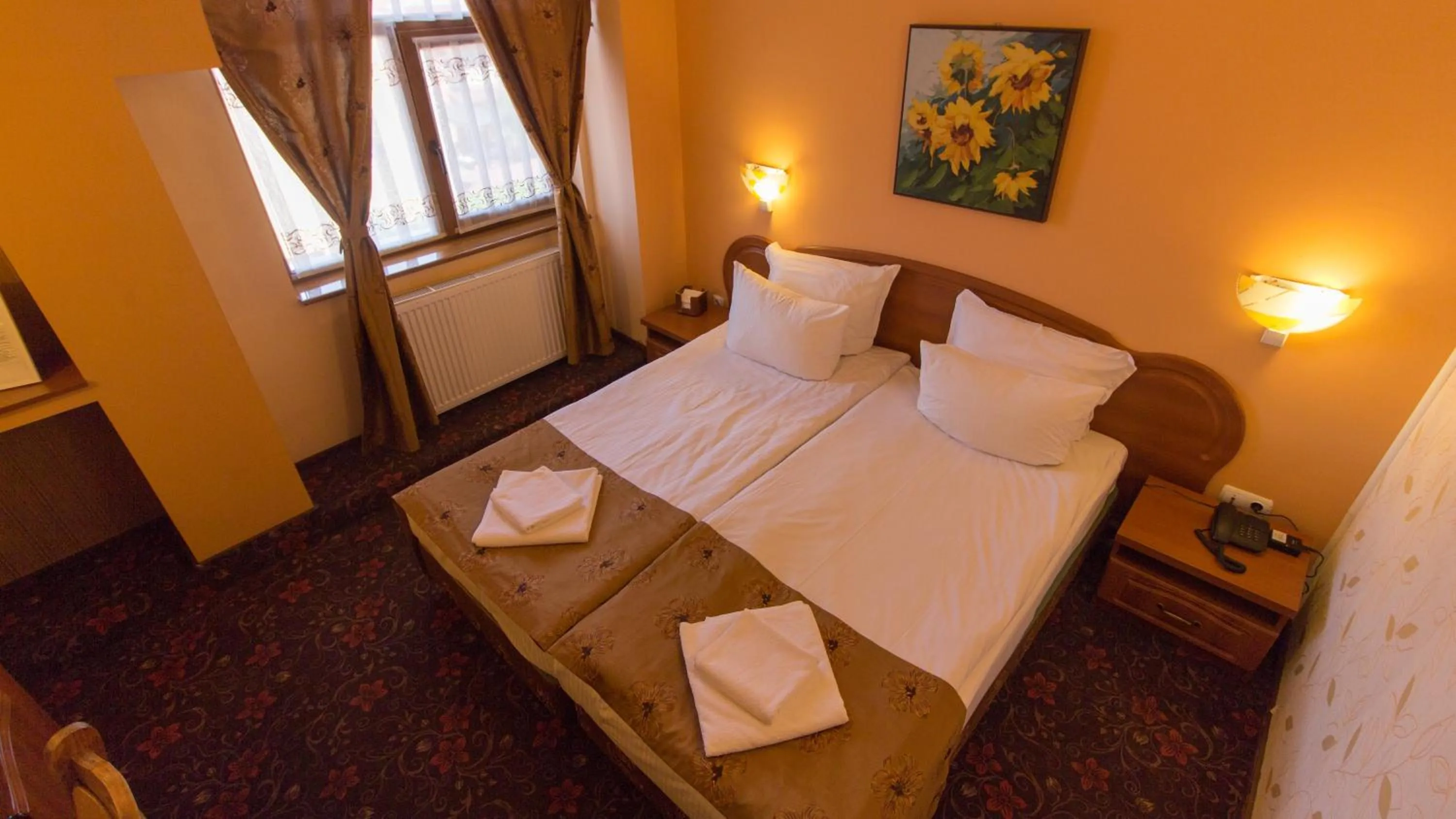Bed in Pension La Fontana