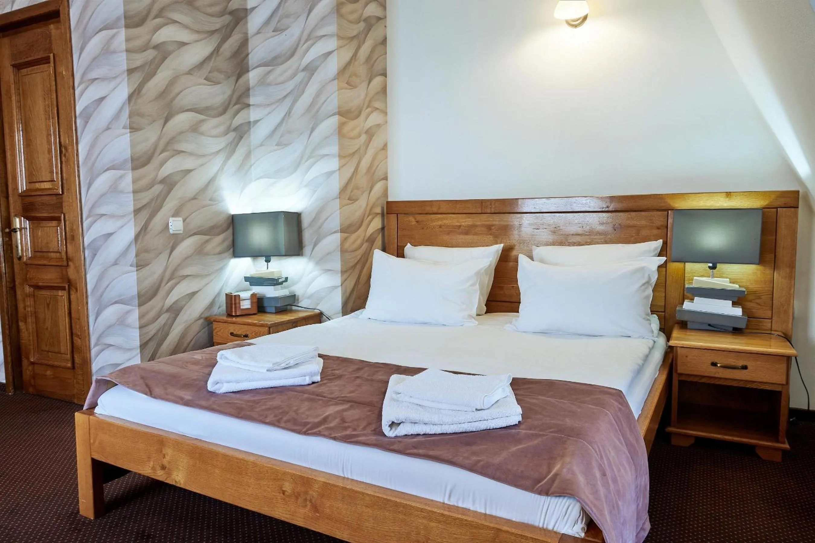 Bed in Pension La Fontana