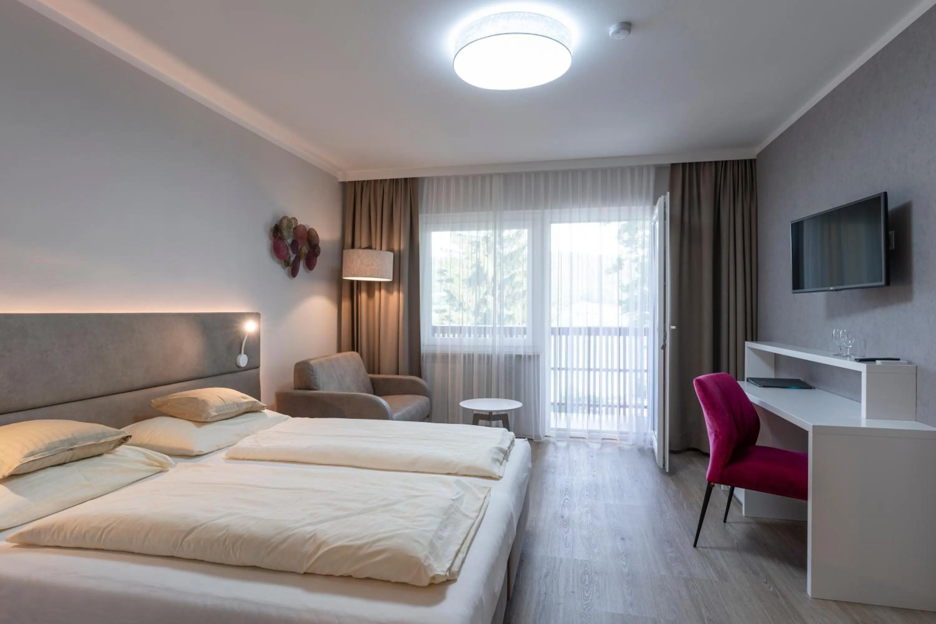 Photo of the whole room, Bed in Seehotel Vinzenz