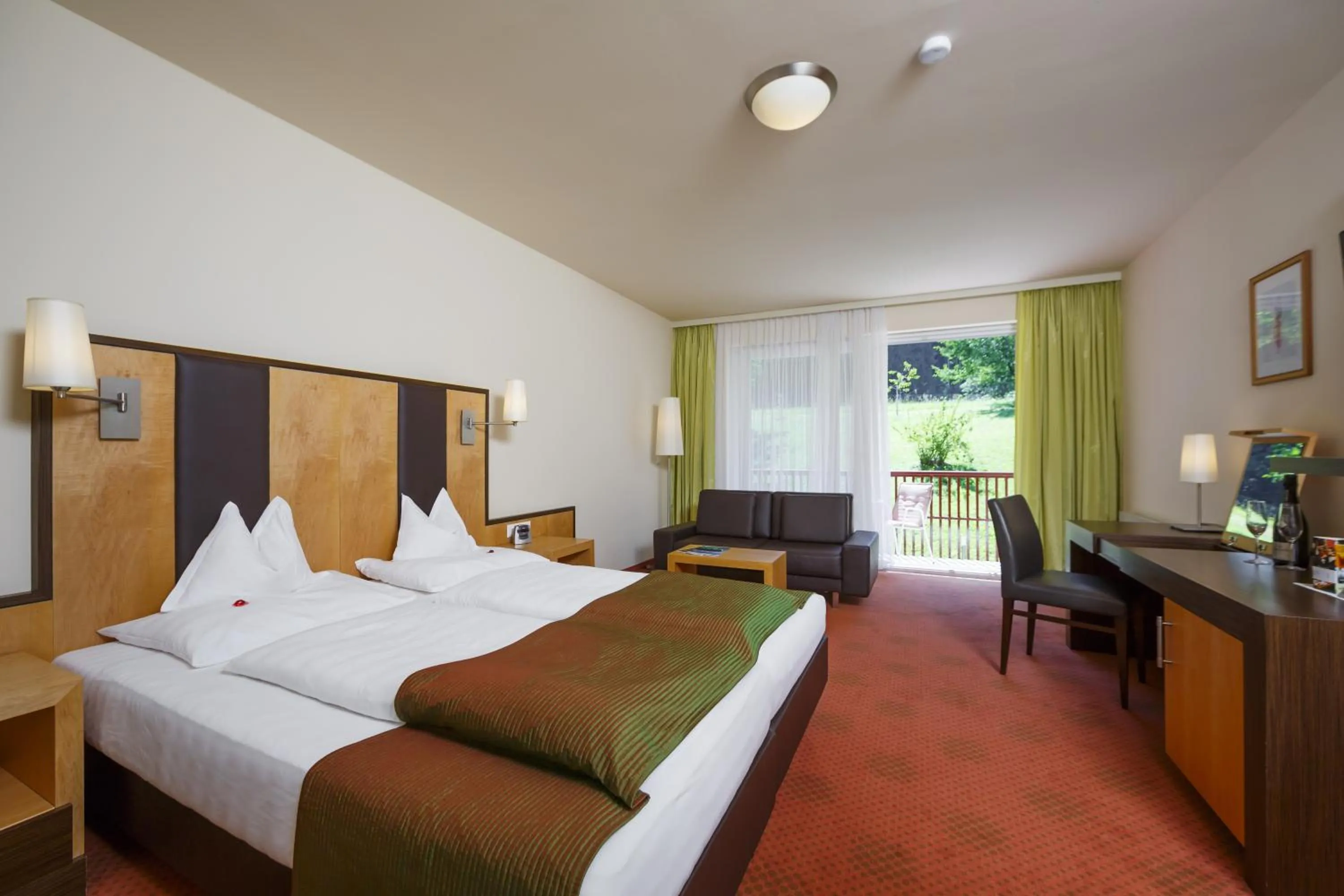 Photo of the whole room, Bed in Seehotel Vinzenz