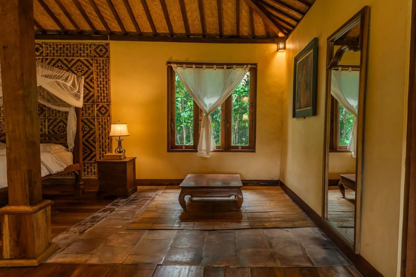 Seating area, Bed in Saridevi Ecolodge